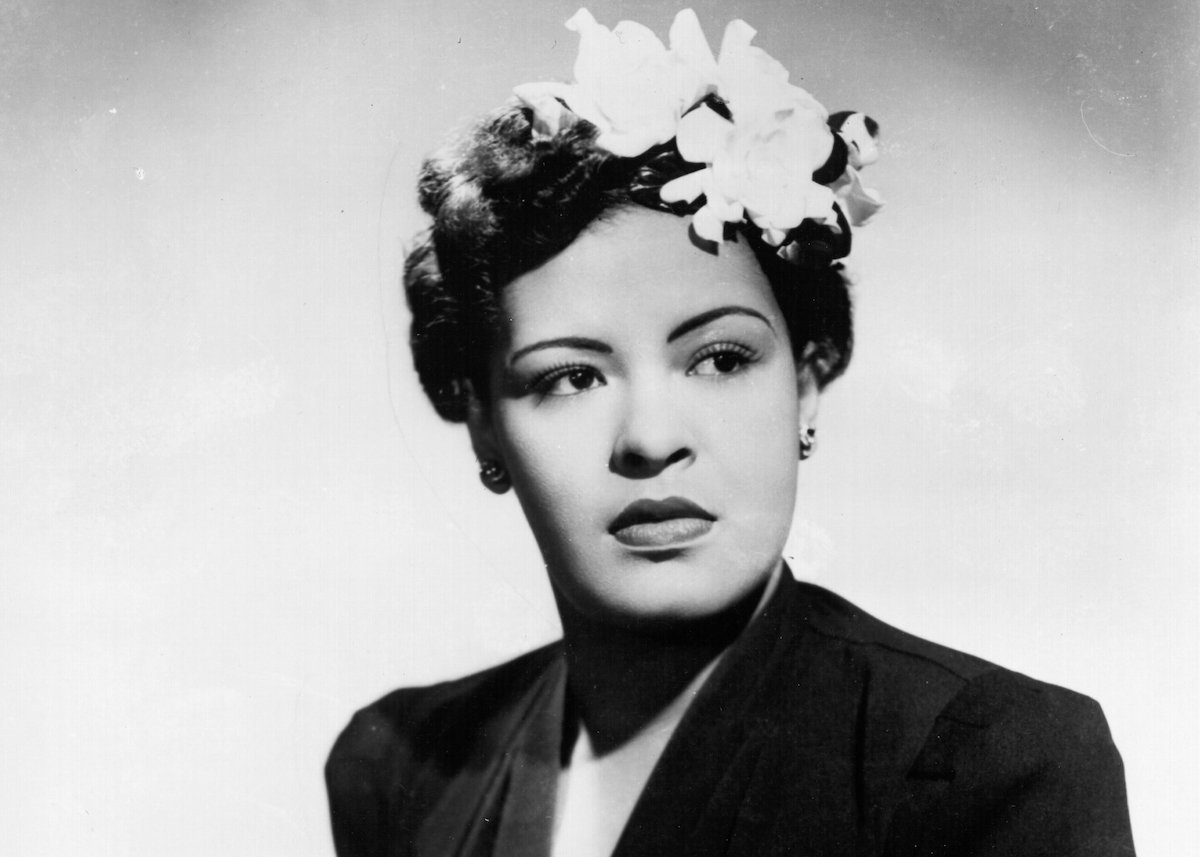 Jazz singer Billie Holiday poses for a portrait circa 1939 with a flower in her hair | Michael Ochs Archives/Getty Images