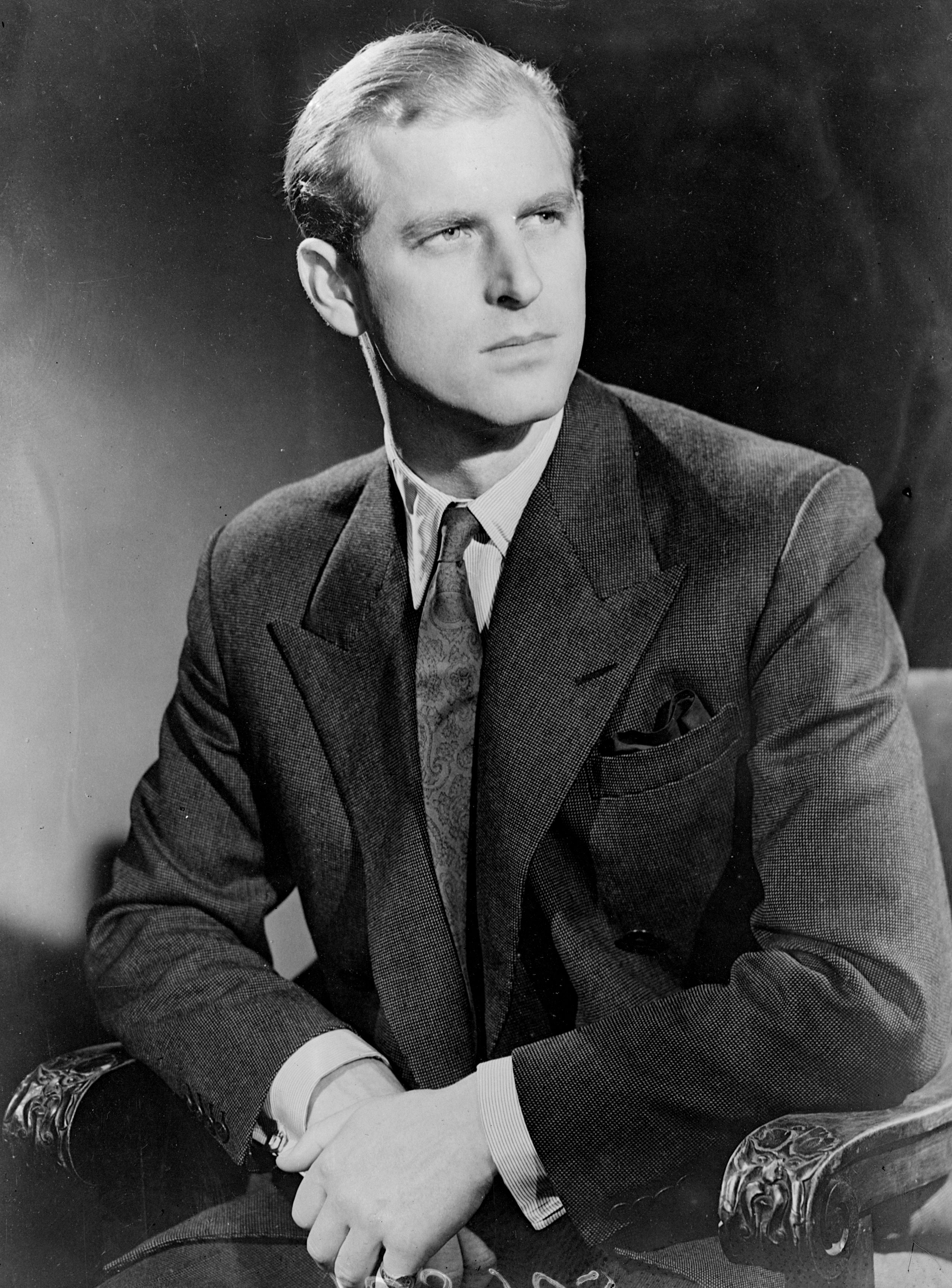 Black-and-white portrait of  Lieutenant Philip Mountbatten, later Prince Philip