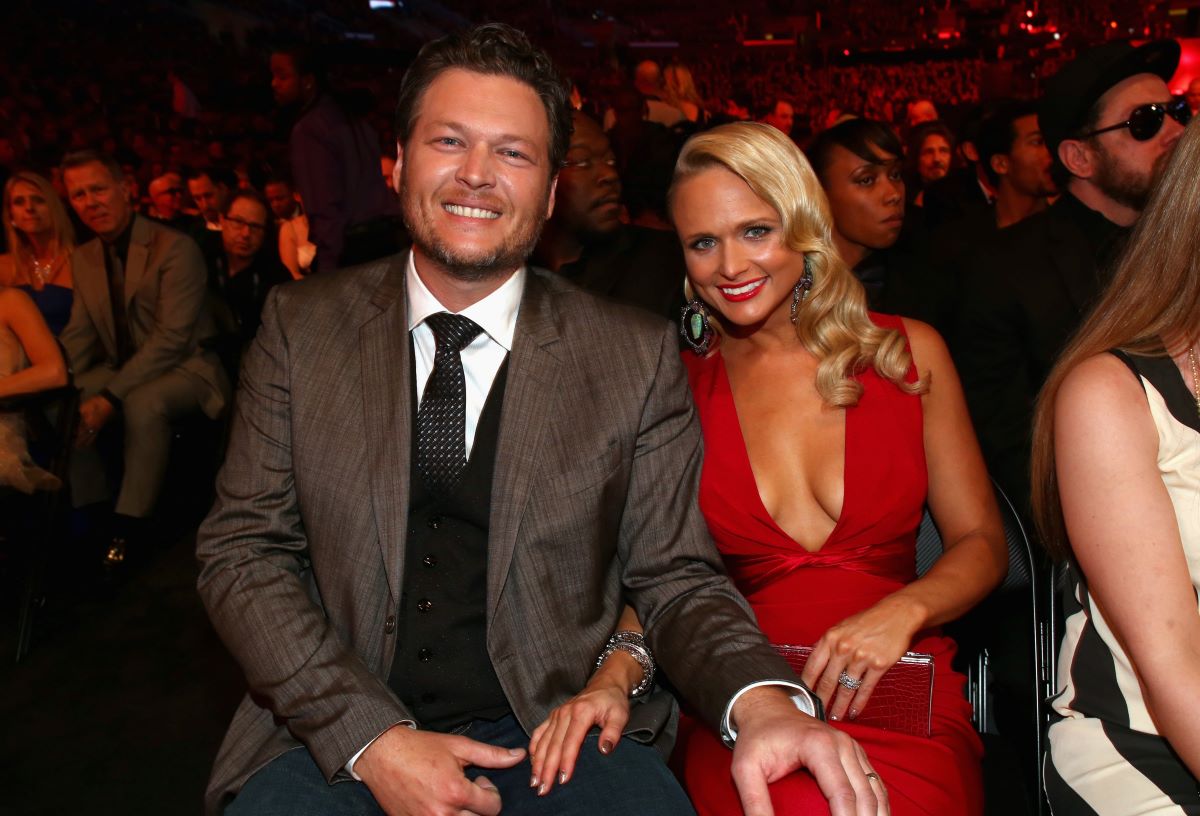 Blake Shelton and Miranda Lambert sit side by side at the 56th GRAMMY Awards
