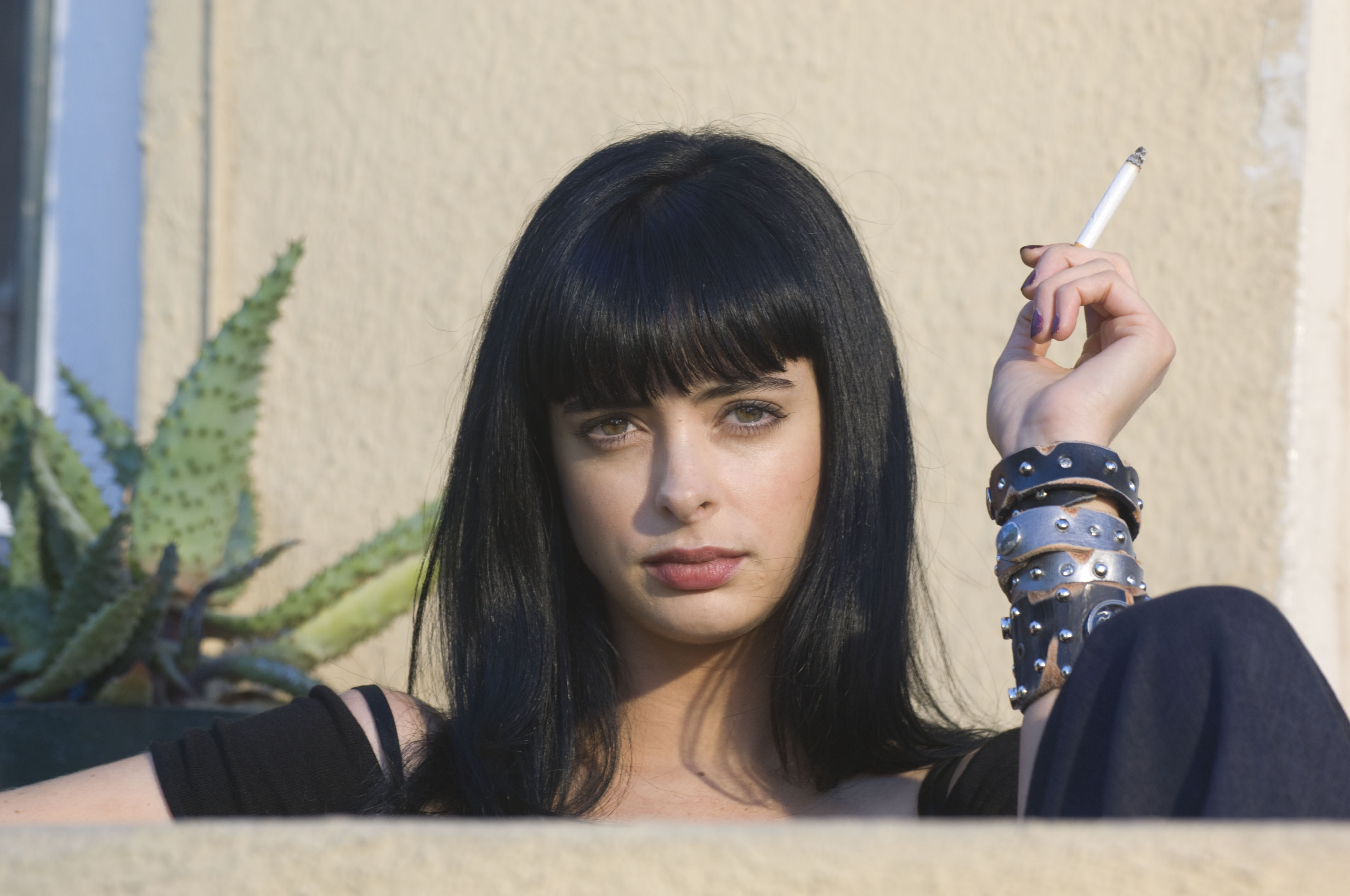 Breaking Bad: Krysten Ritter holding a cigarette