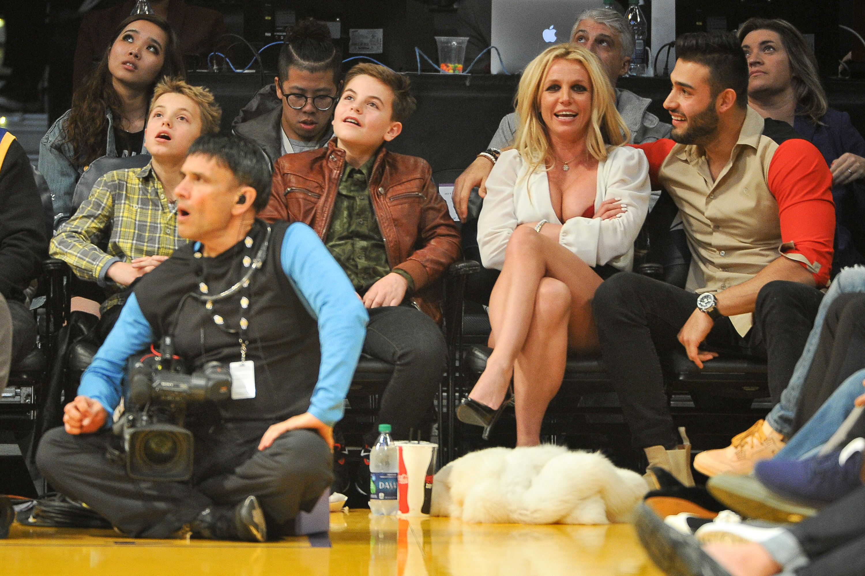 Britney Spears with her boyfriend Sam Asghari and her sons, Sean Preston Federline and Jayden James Federline, at a Los Angeles Lakers basketball game together