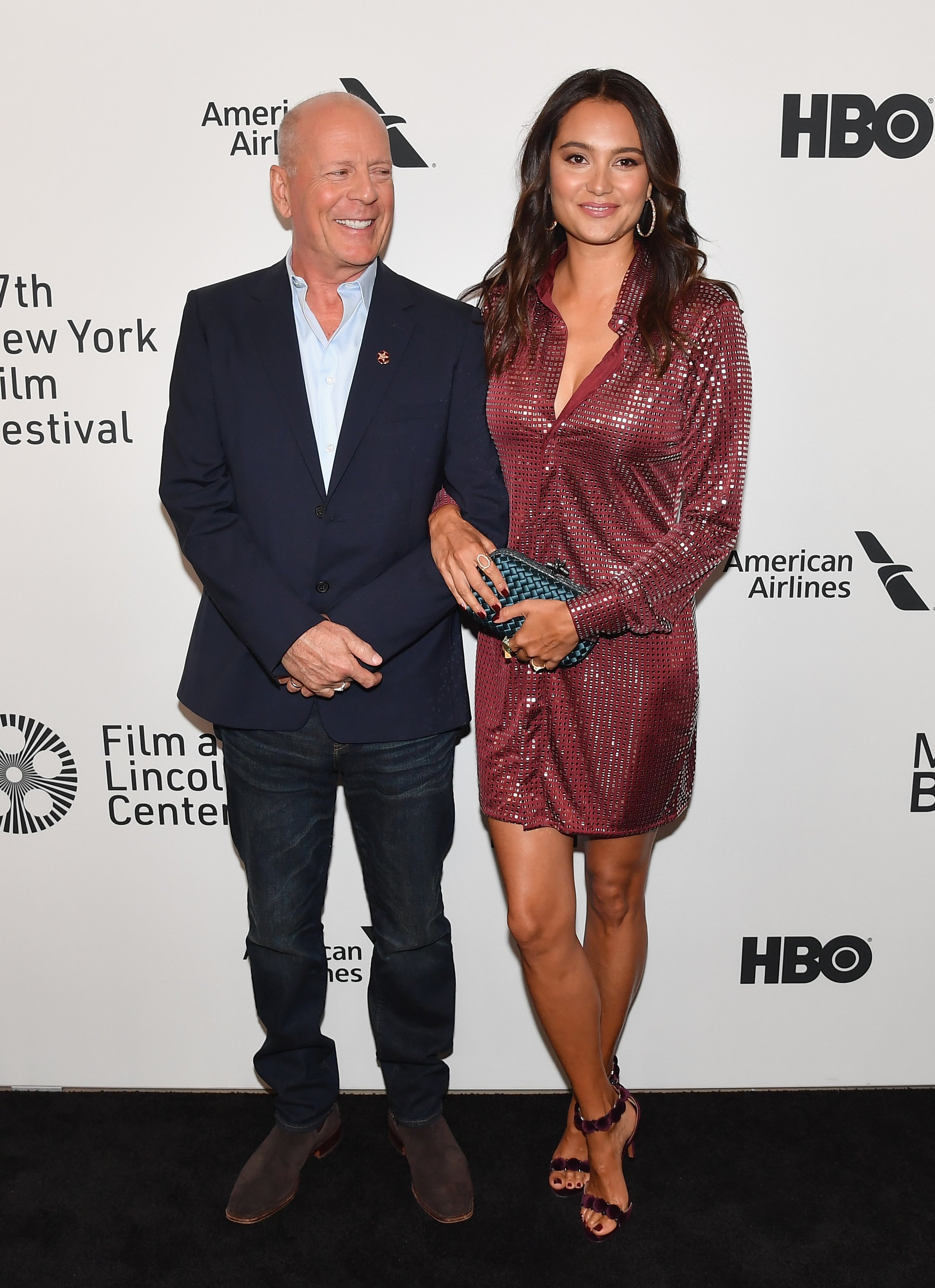 Bruce Willis and wife Emma Heming Willis pose arm in arm at premiere of Motherless Brooklyn' in 2019
