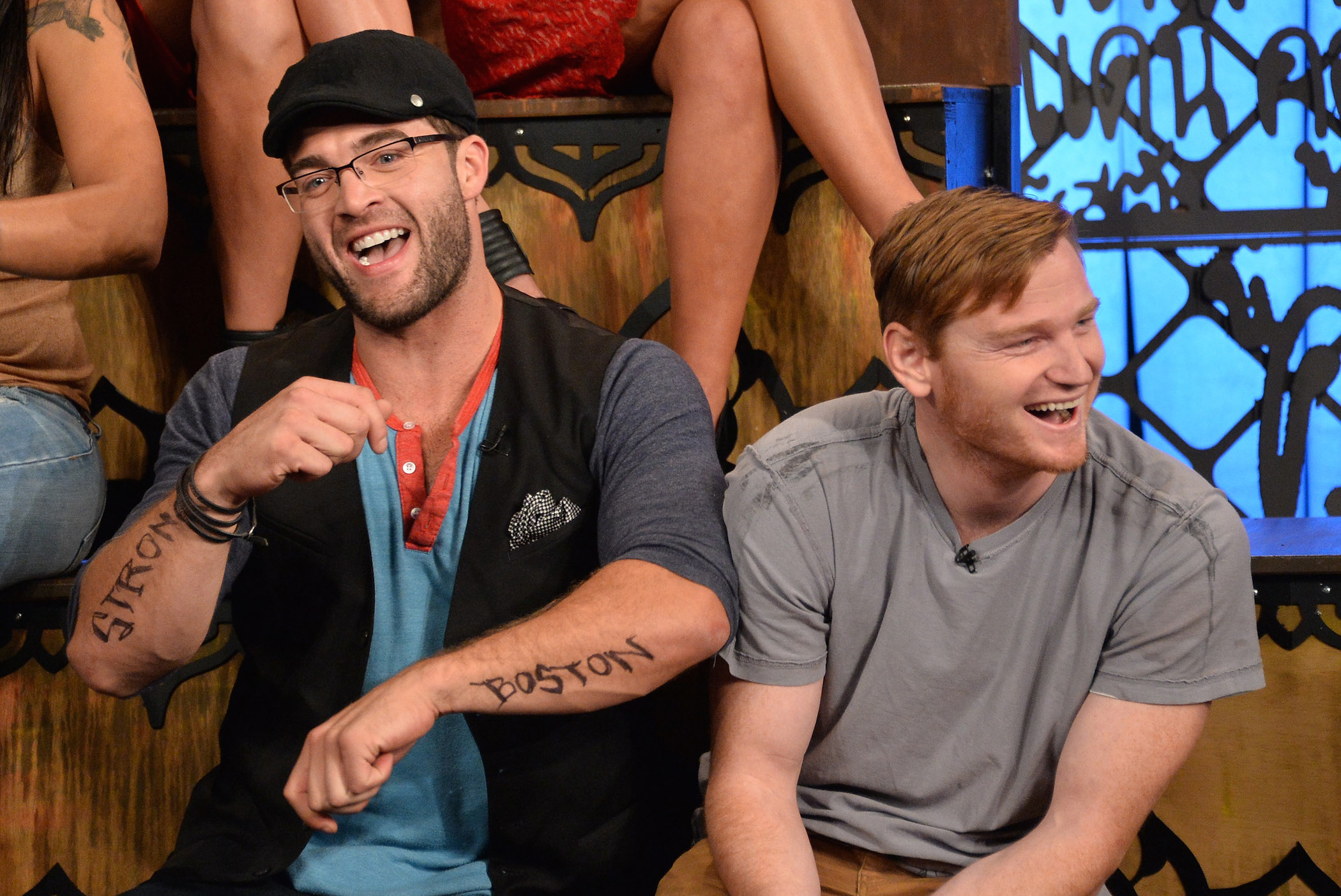 CT Tamburello and Wes Bergmann sitting and laughing together MTV's 'The Challenge' reunion