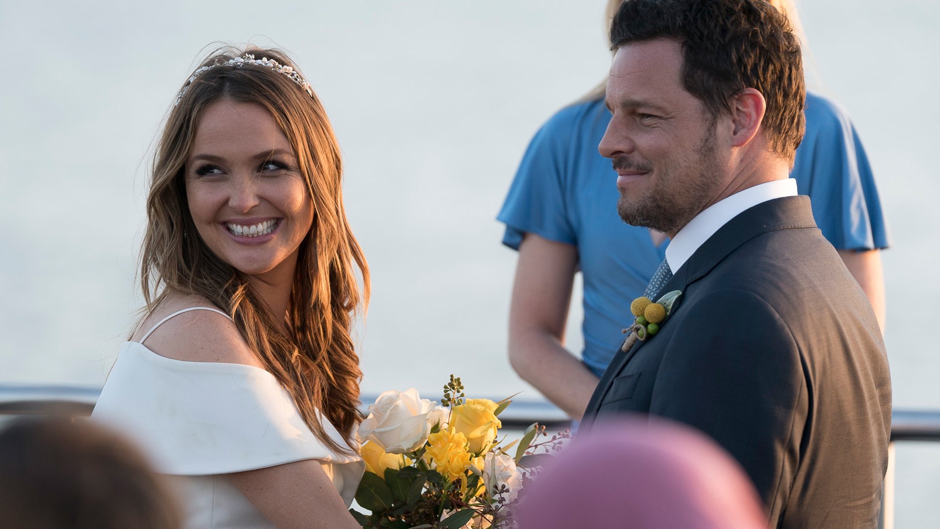 Camilla Luddington as Jo Wilson and Justin Chambers as Alex Karev get married on a boat in ‘Grey’s Anatomy’ Season 14
