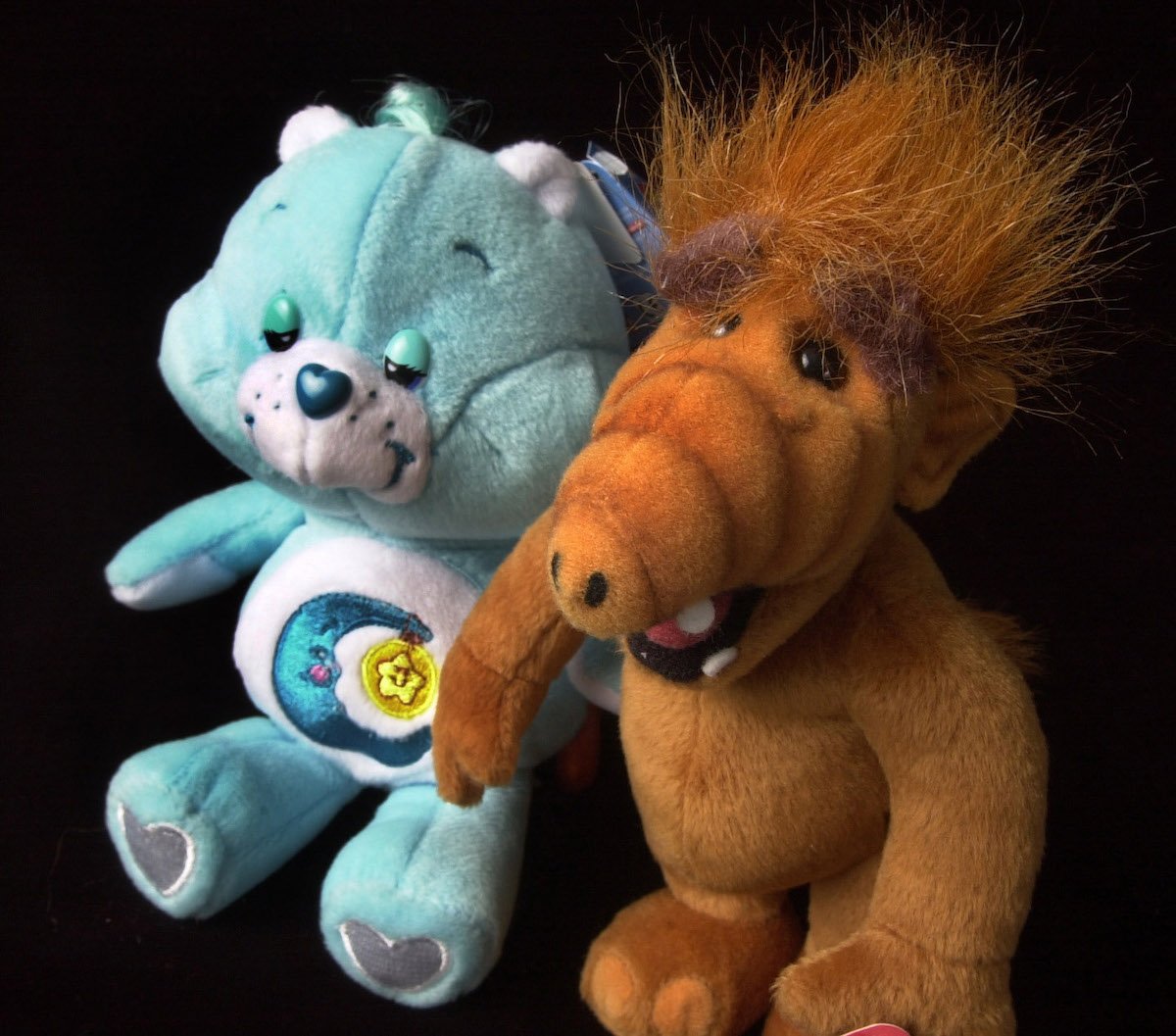 Plush toys reminiscent of the 1980s TV shows featuring the Care Bears and ALF