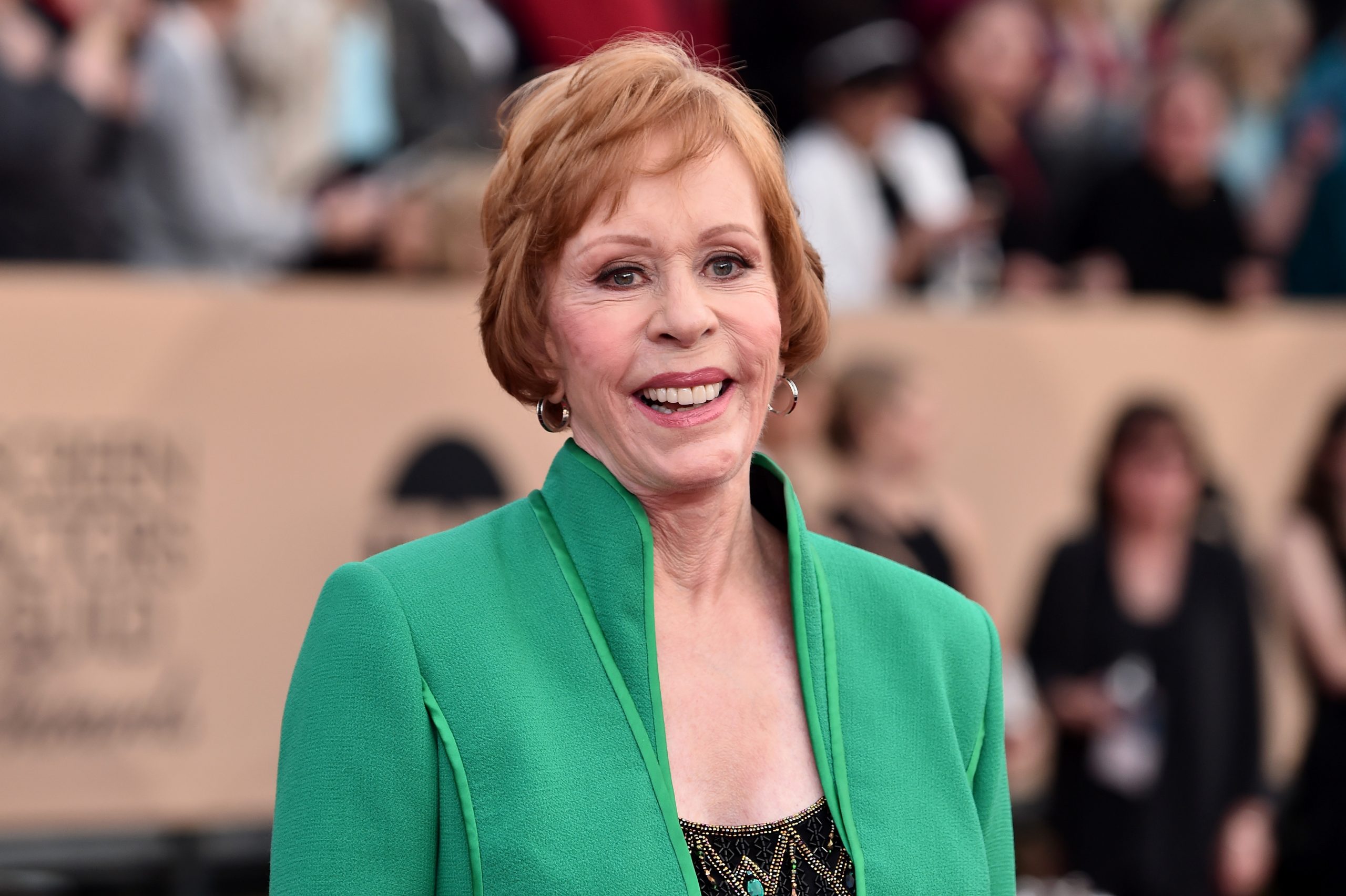 Carol Burnett dons a green blazer and smiles on the red carpet at the Screen Actors Guild Awards