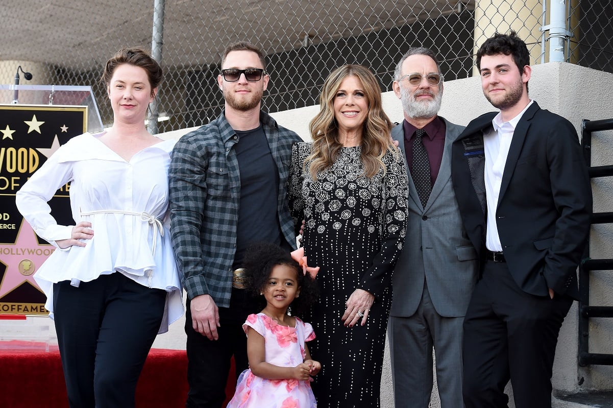 Chet Hanks poses with daughter and  rest of family on Hollywood Walk of Fame in front of his mom Rita Wilson's star