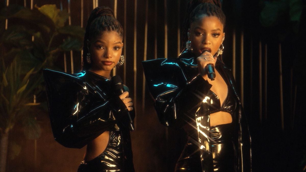 Chloe x Halle performing in black vinyl coats at the 2020 BET Awards | BET Awards 2020/Getty Images