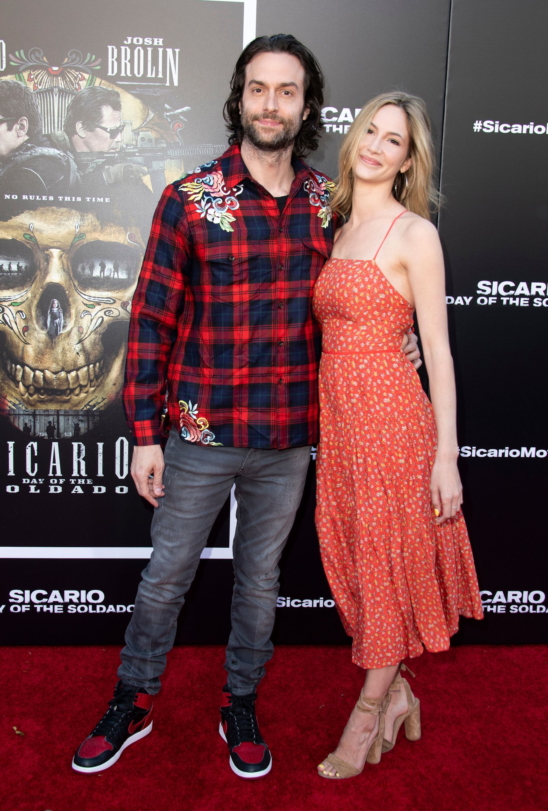 Chris D'Elia's girlfriend, Kristin Taylor, standing and smiling with Chris D'Elia