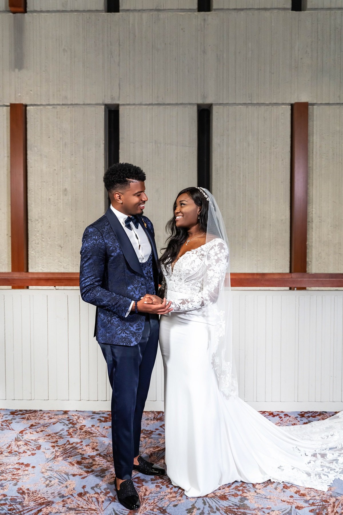 Chris Williams II and Paige Banks pose in their wedding dress and suit on 'Married at First Sight'
