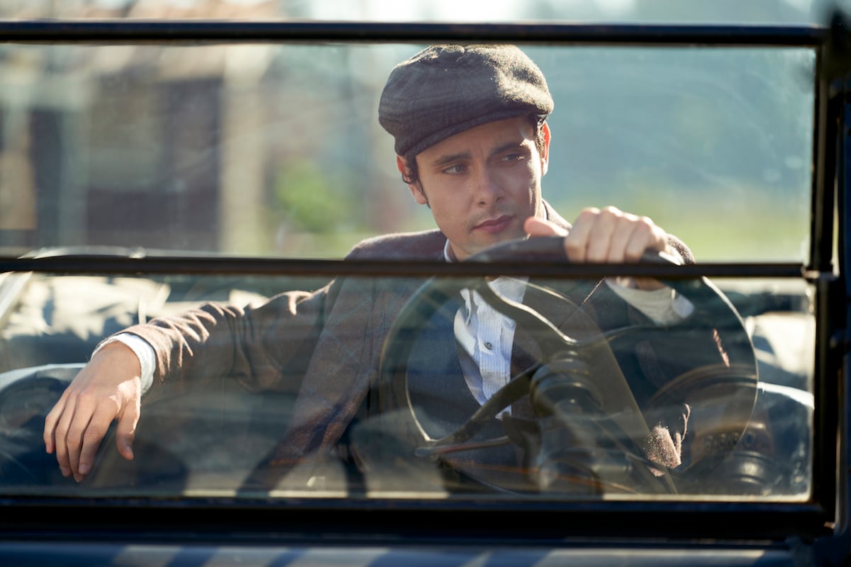 Christopher behind the wheel of a car in When Calls the Heart