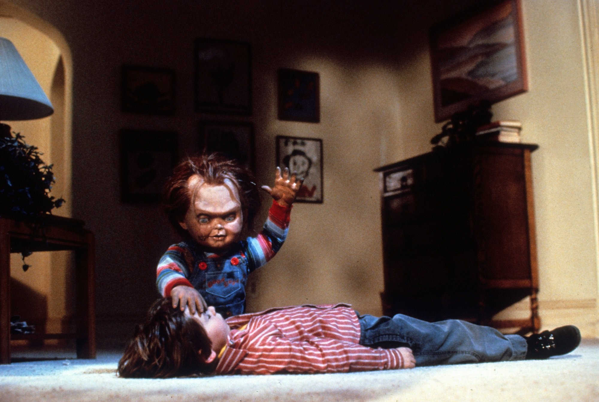 Chucky performs voodoo on Alex Vincent