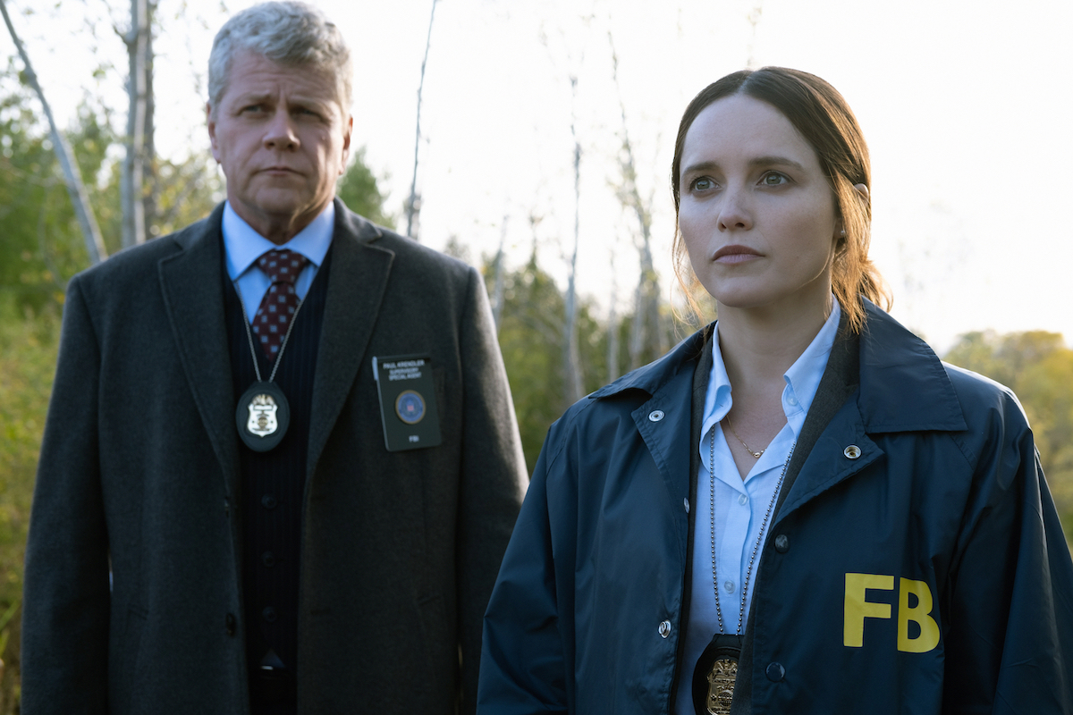 Rebecca Breeds as Clarice Starling and Michael Cudlitz as Paul Krendler stand in their uniforms on 'Clarice'