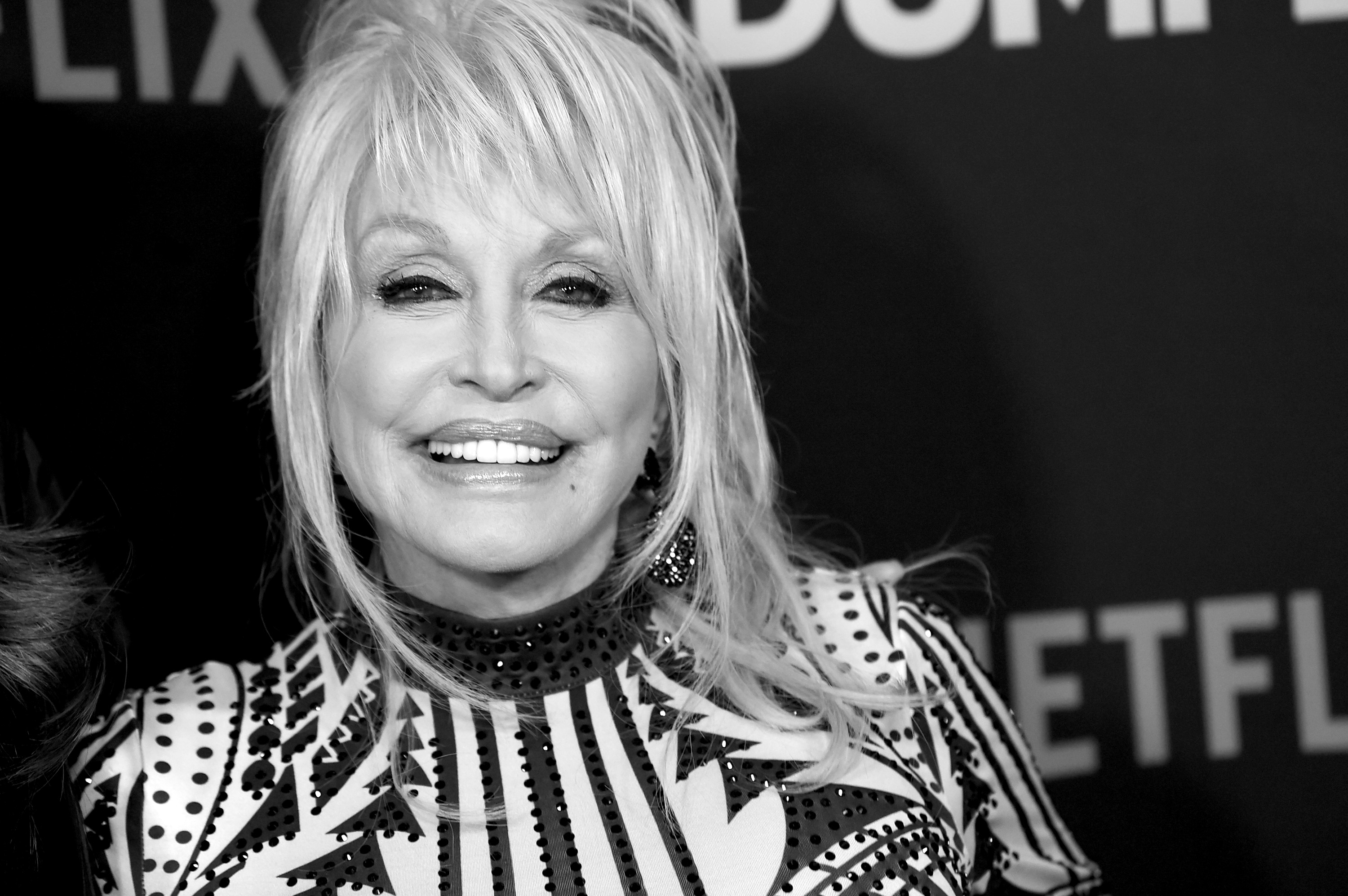 A black and white close-up of Dolly Parton at the premiere of Netflix's 'Dumplin.'