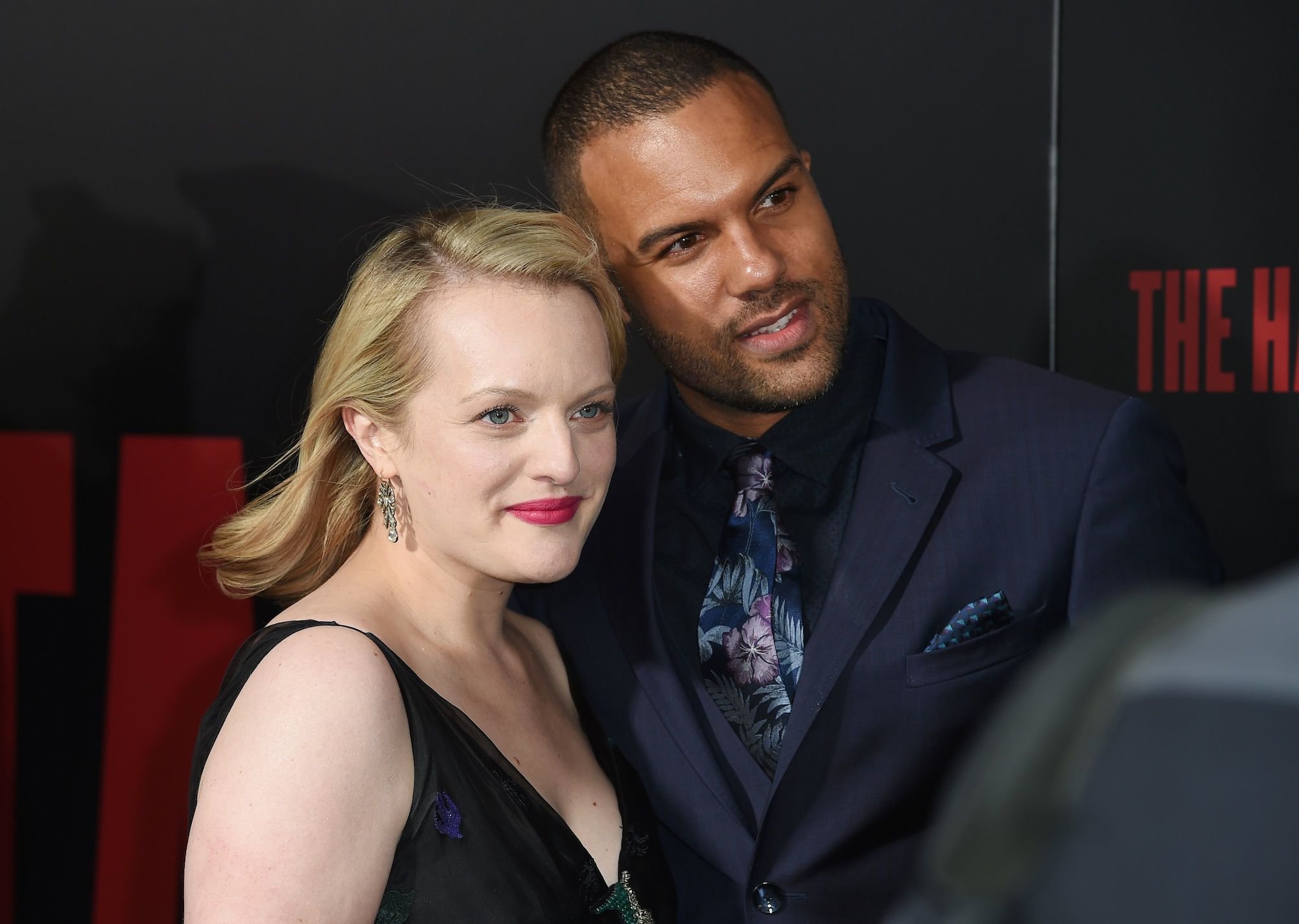 Elisabeth Moss (L) and O-T Fagbenle, leads of 'The Handmaid's Tale' cast, standing together for a photo