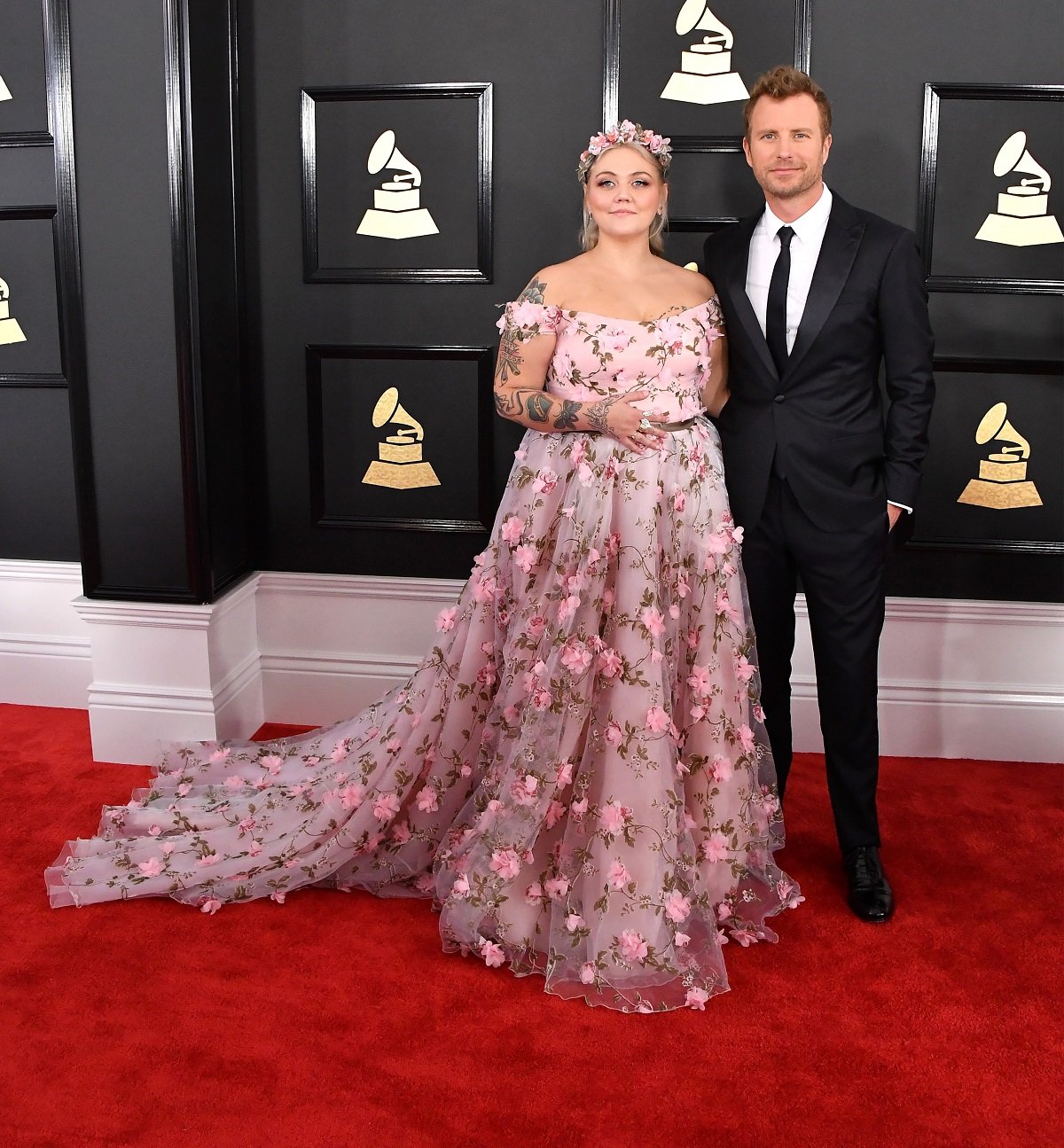 Elle King, in a Lirika Matoshi floral gown, and Dierks Bentley on the red carpet at the 2017 Grammys