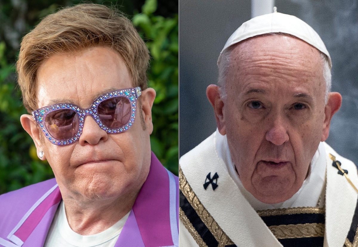 Sir Elton John in a purple coat and purple, starred sunglasses (L), and Pope Francis in a white robe with black and gold embellishments (R) | Marc Piasecki/Vatican Pool/Getty Images