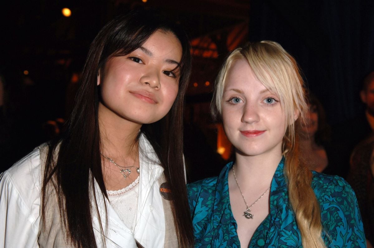 Evanna Lynch and Katie Leung smile together at Golden Compass World Premiere afterparty
