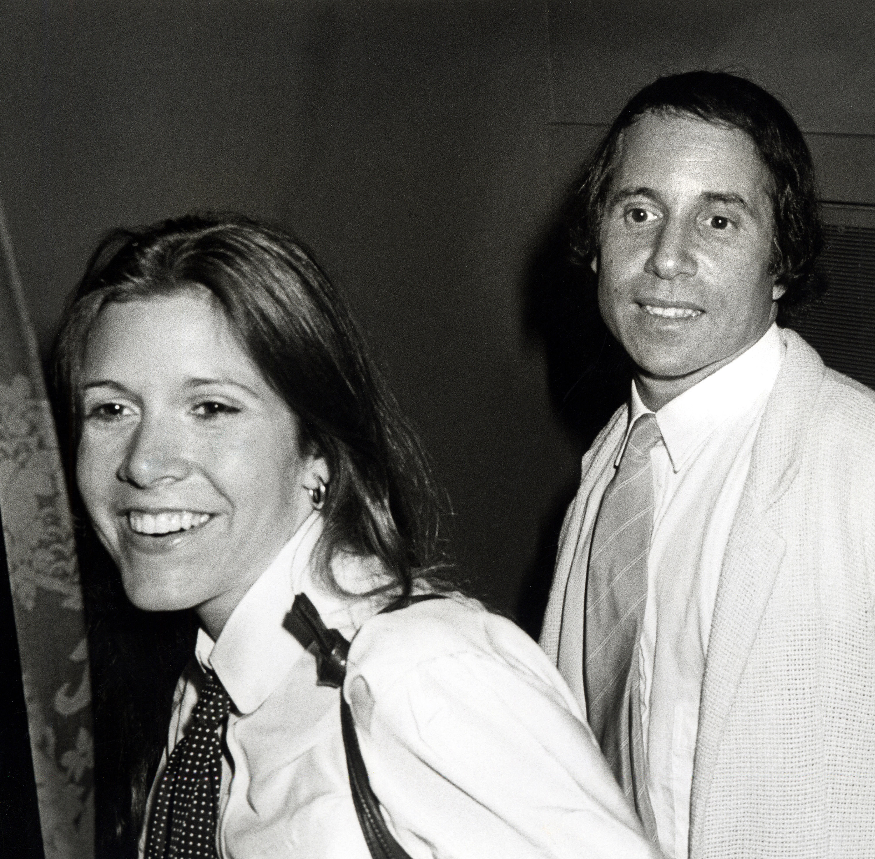 Carrie Fisher and Paul Simon in 1979