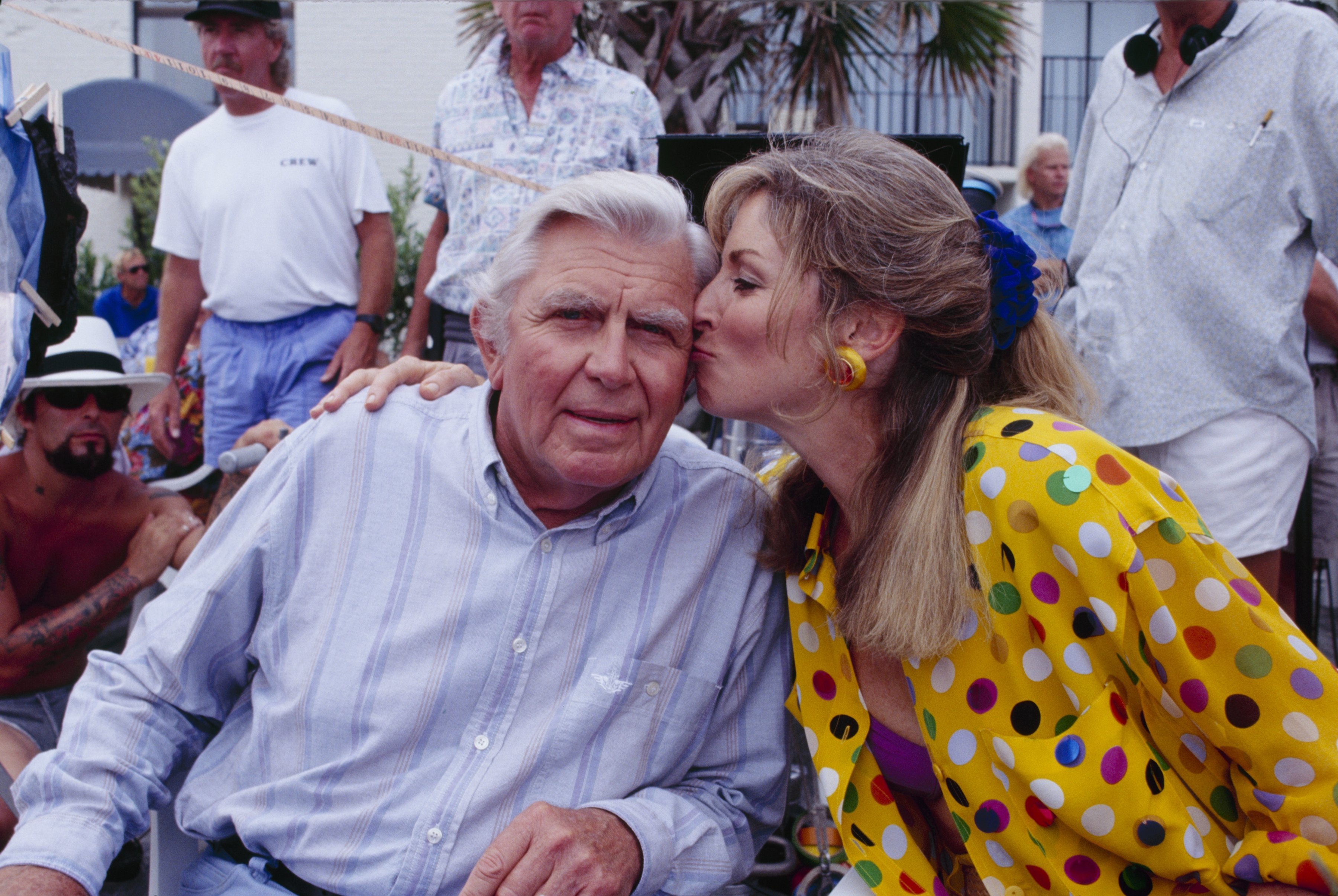 Brynn Thayer gives her 'Matlock' co-star Andy Griffith a peck on the cheek on the show's set, 1992
