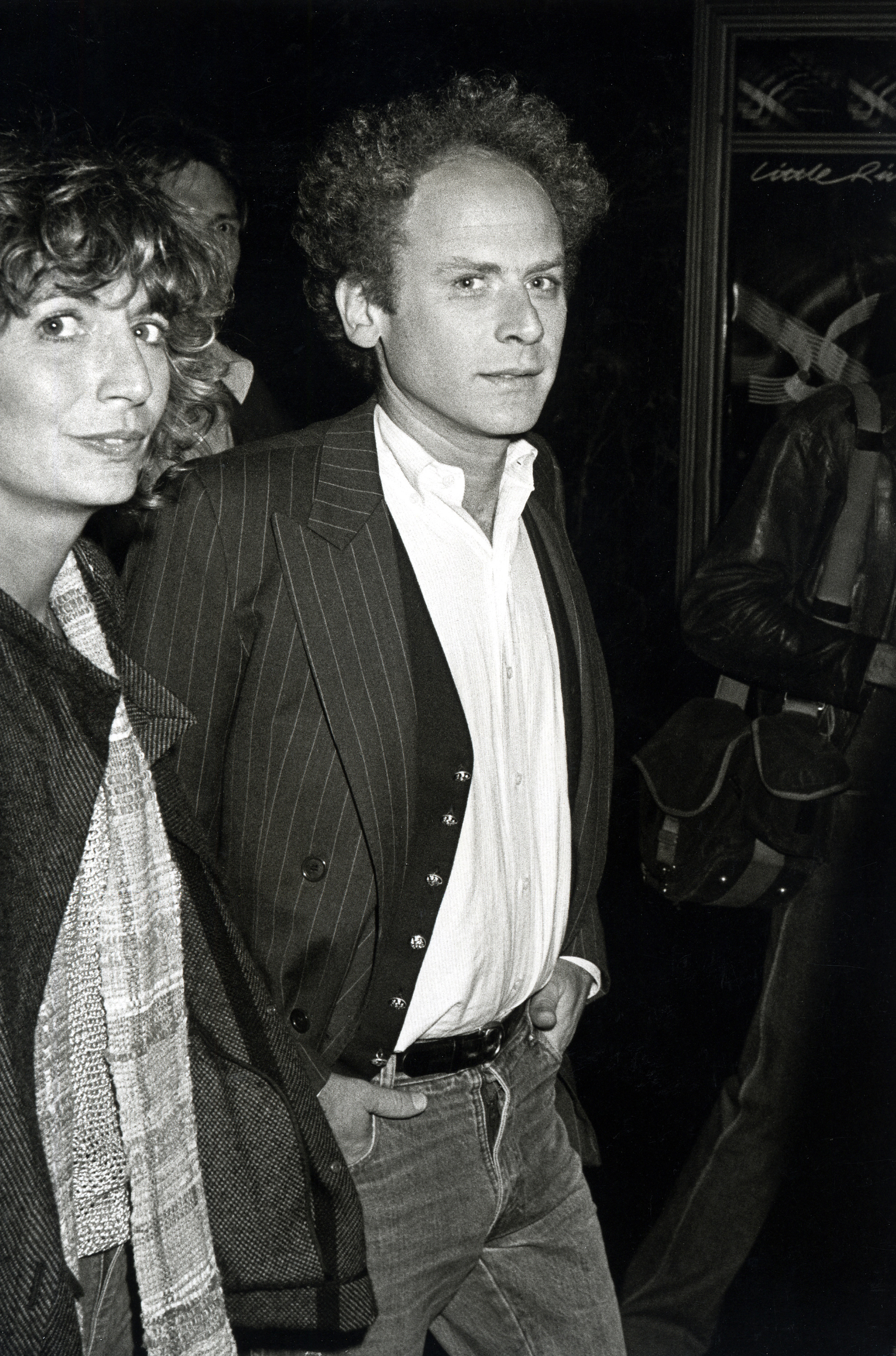 A black and white photograph of actor Penny Marshall with musical artist Art Garfunkel
