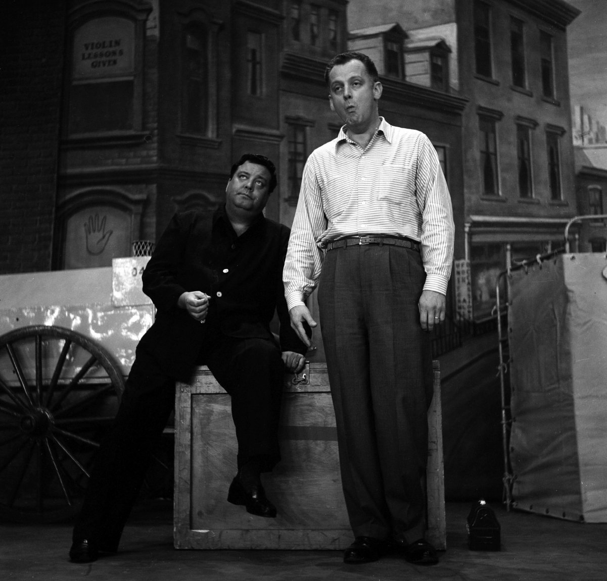 (L to R): Jackie Gleason and Art Carney on stage during rehearsals for 'The Jackie Gleason Show,' 1955