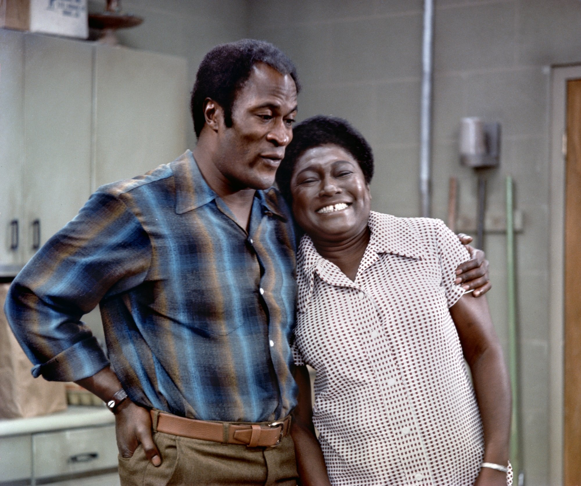 Good Times star John Amos with his arm around co-star Esther Rolle