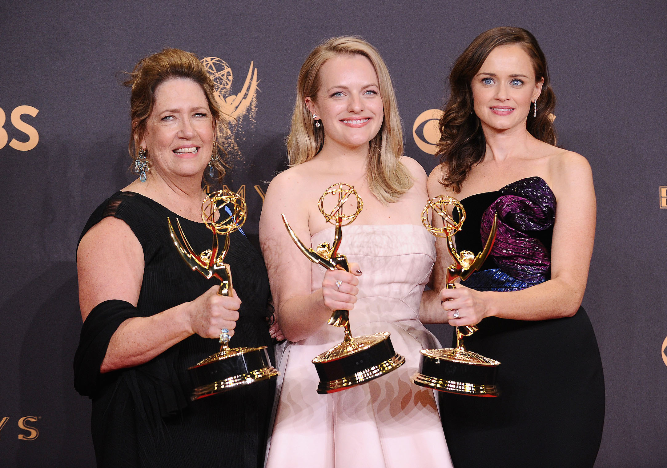 Ann Dowd, Elisabeth Moss, and Alexis Bledel, members of 'The Handmaid's Tale' cast, accepting an award for 'The Handmaid's Tale'