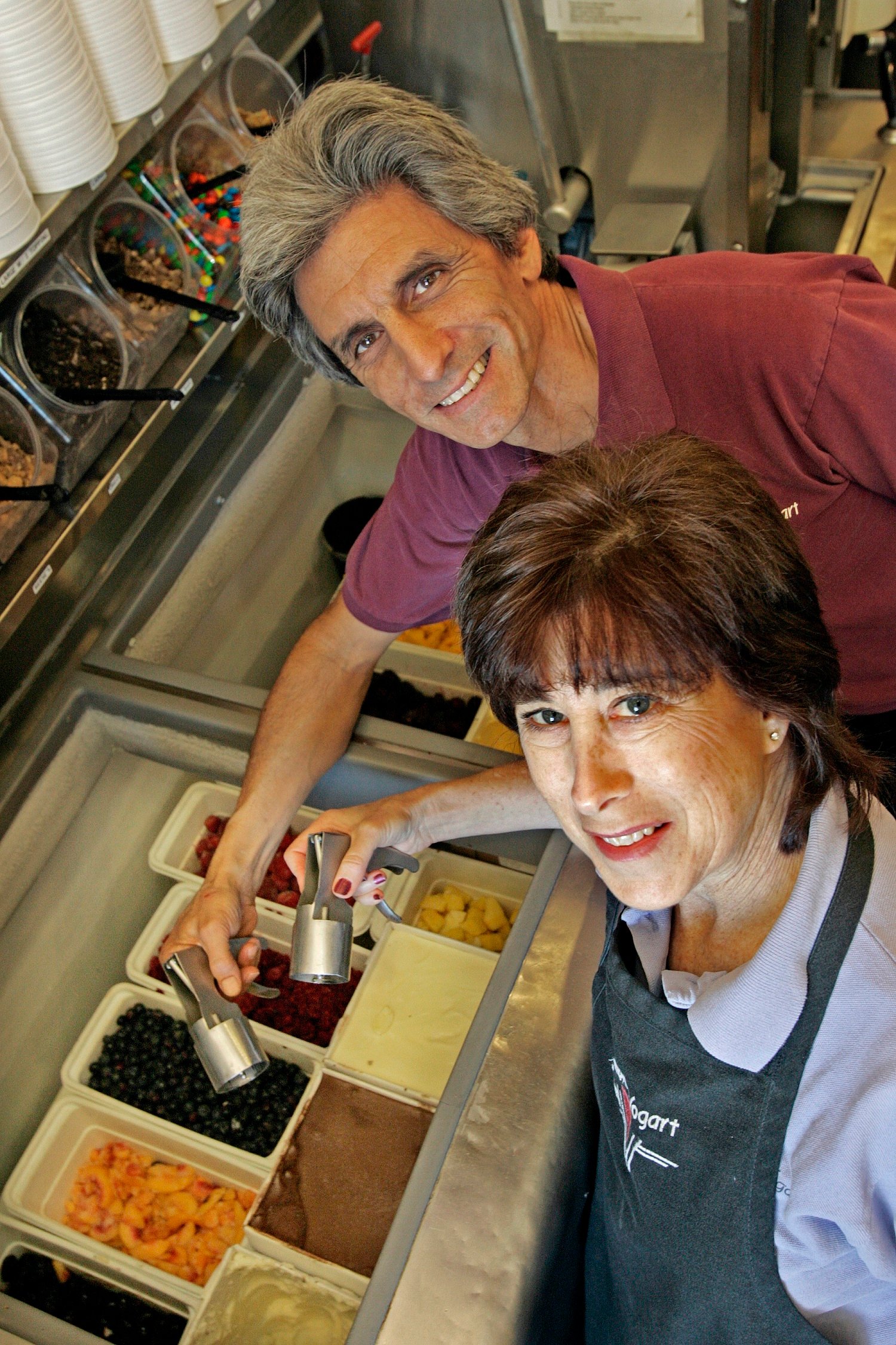 Humphrey Yogart owners Jim and Paula Sheftel show off the toppings at the original Sherman Oaks location