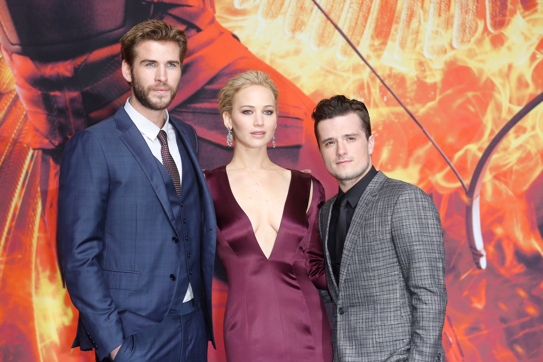 Liam Hemsworth, Jennifer Lawrence, and Josh Hutcherson attend 'The Hunger Games: Mockingjay - Part 2' world premiere