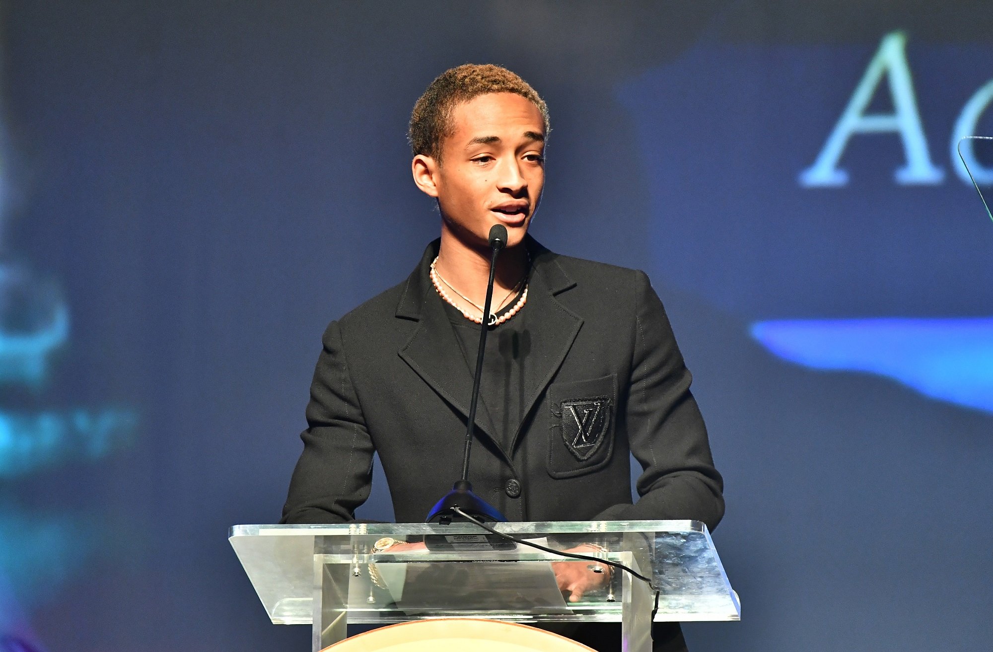 Jaden Smith speaks at podium at Summit for Greatness