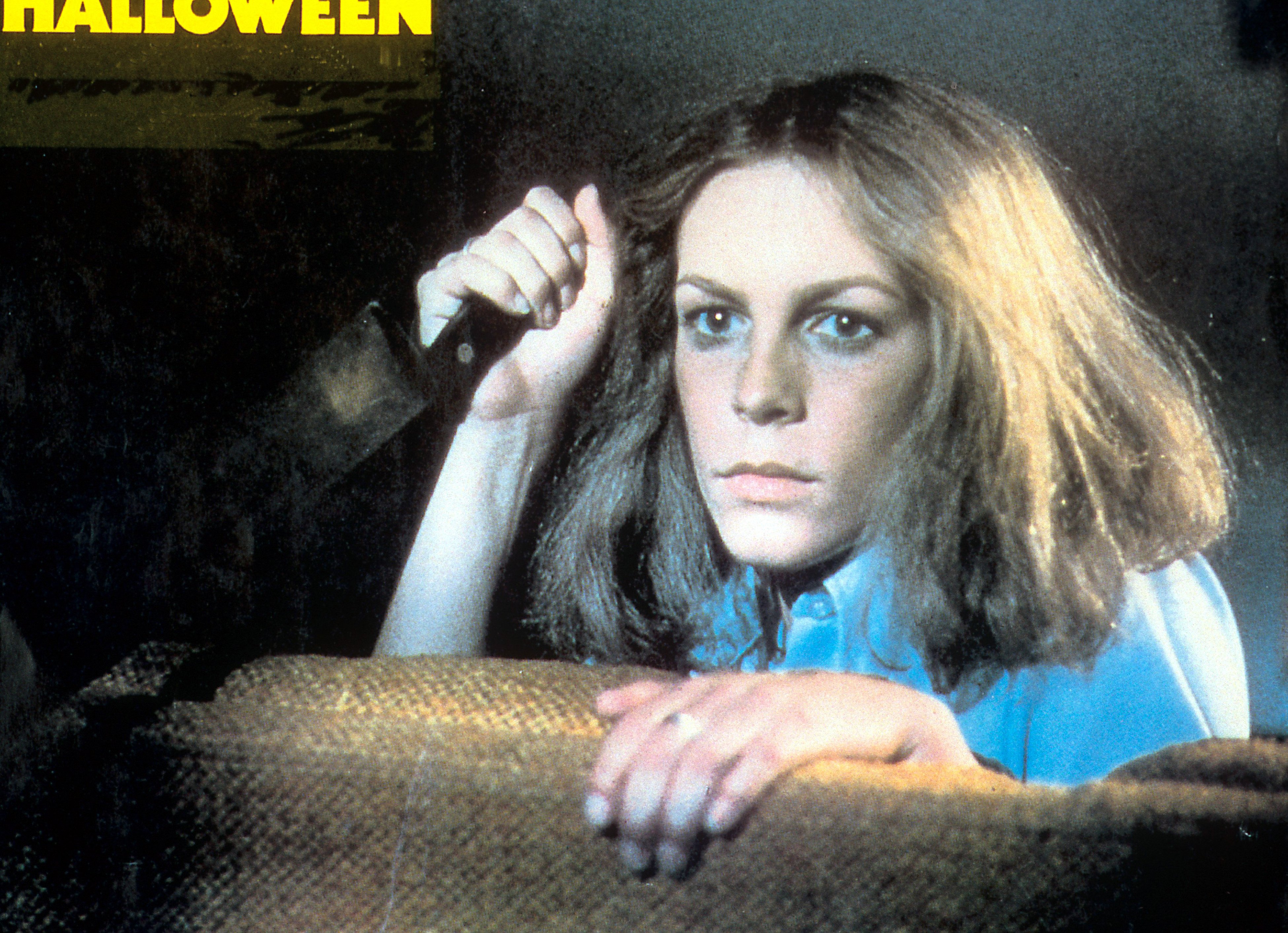 Jamie Lee Curtis holds a knife in a scene from the film 'Halloween', 1978