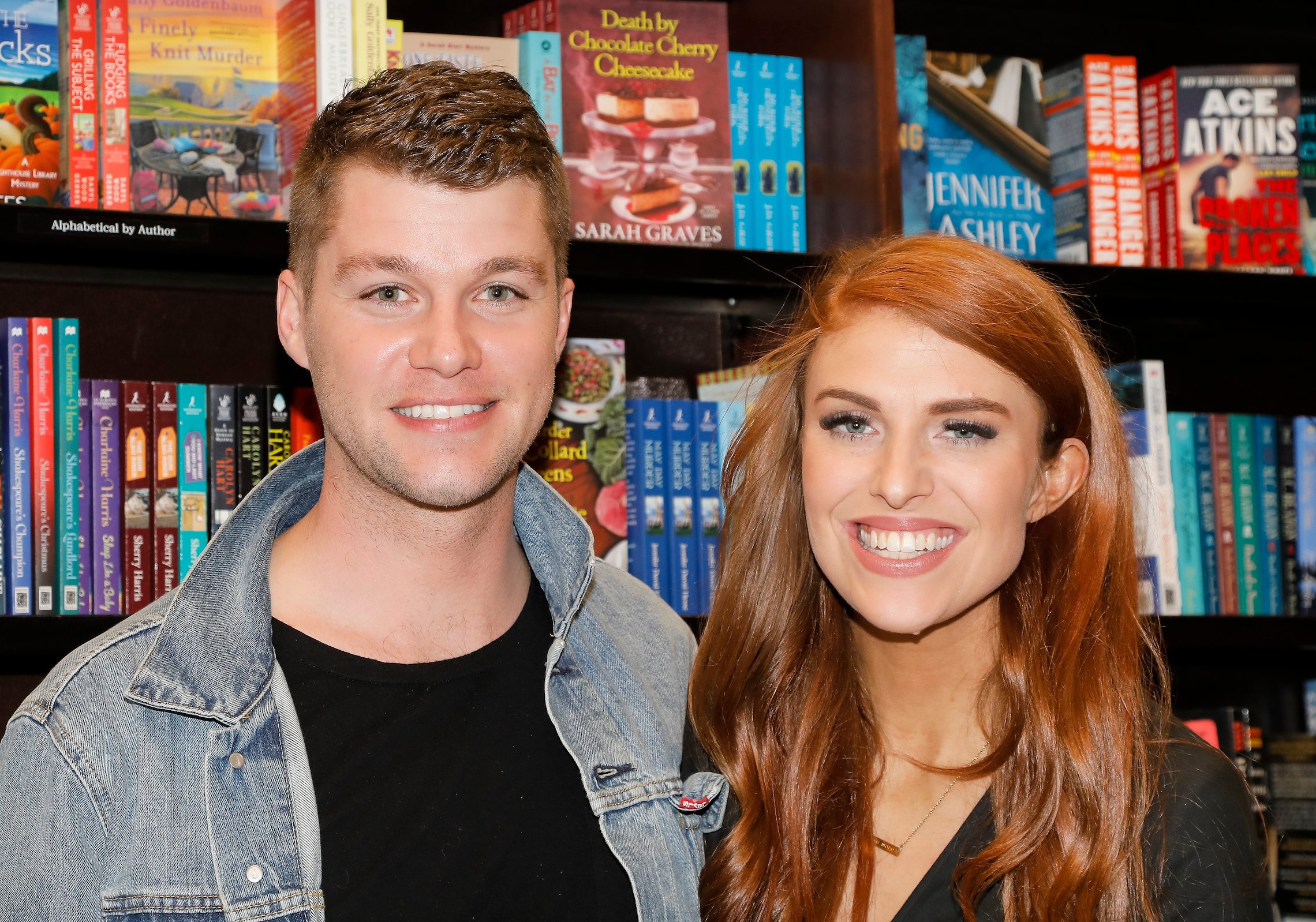 Jeremy Roloff, a member of the Roloff family from TLC's 'Little People, Big World,' and his wife, Audrey Roloff, smiling at a book signing