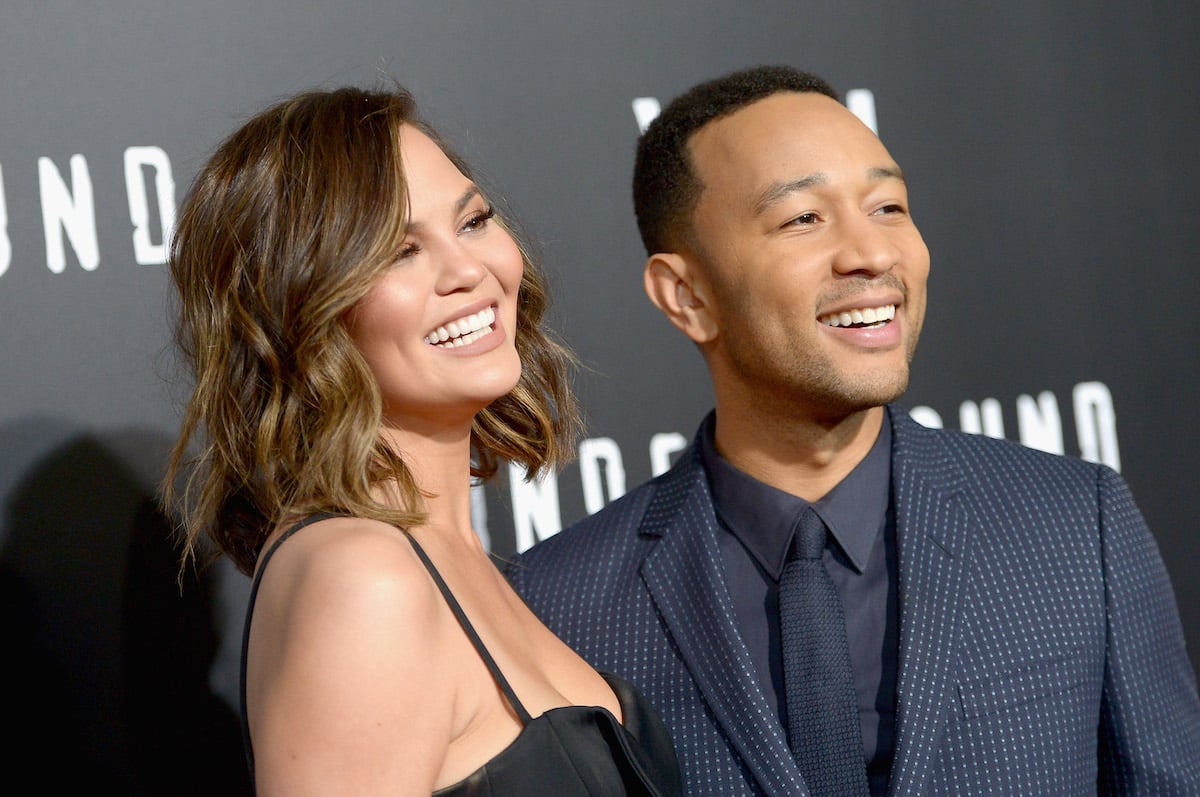 Chrissy Teigen (L) and actor/singer/executive producer John Legend attends the after party for WGN America