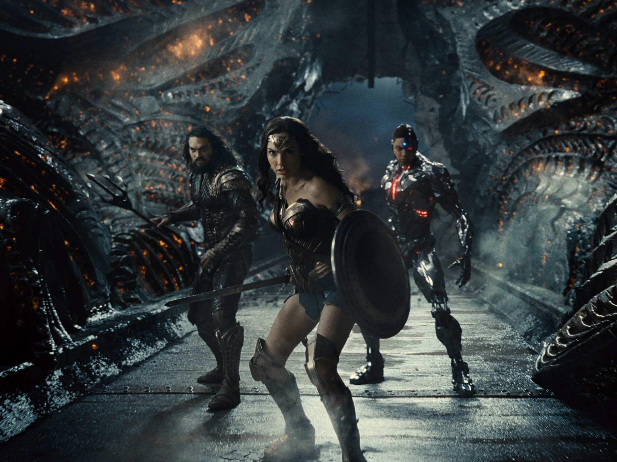 Justice League members Aquaman, Wonder Woman and Cyborg prepare for battle