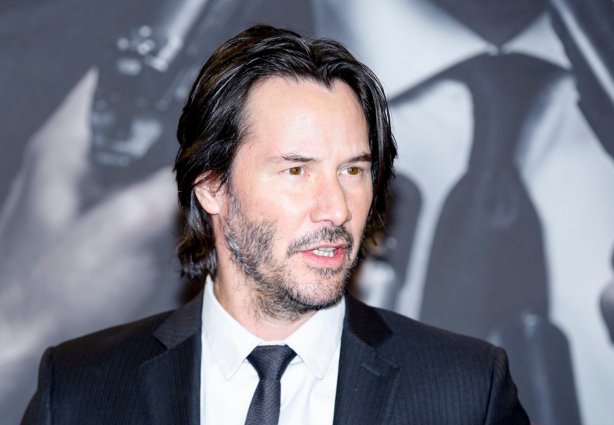 Keanu Reeves wears a suit at the John Wick 2 premiere