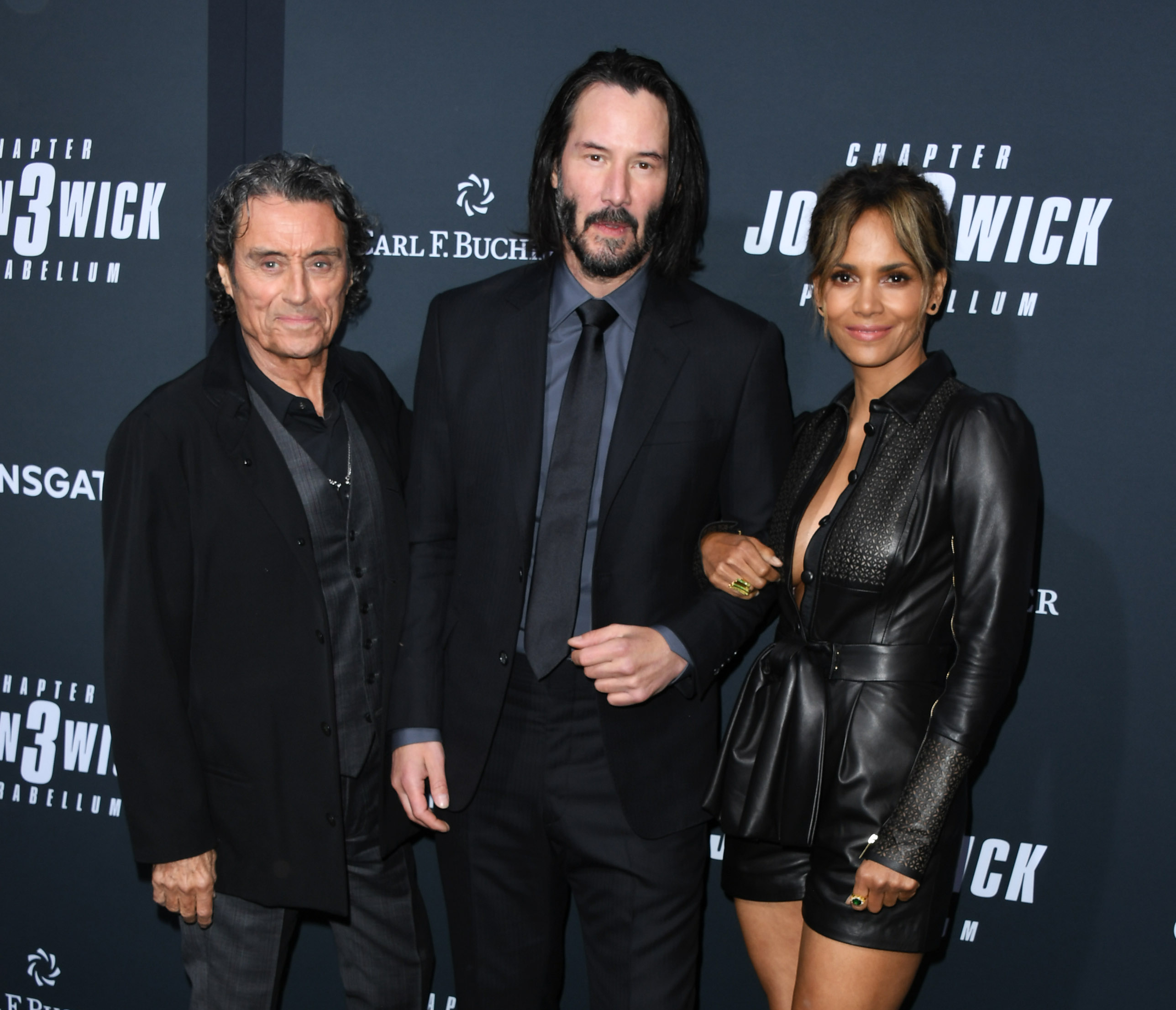 Keanu Reeves with Halle Berry and Ian McShane on the red carpet