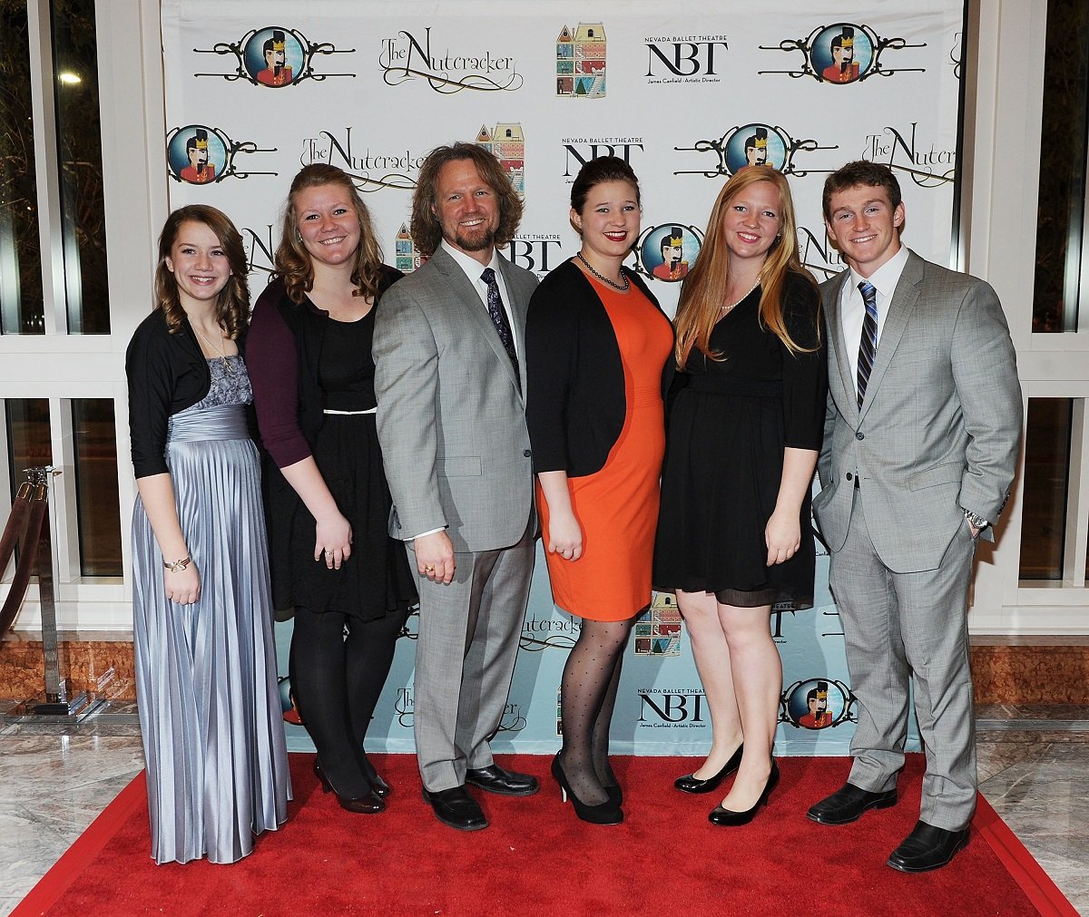 Kody Brown and kids (Aurora, Mariah, Mykelti, Aspyn, and Logan Brown) on the red carpet at Nevada Ballet Theater's "The Nutcracker" at The Smith Center For The Performing Arts in 2013 in Las Vegas, Nevada