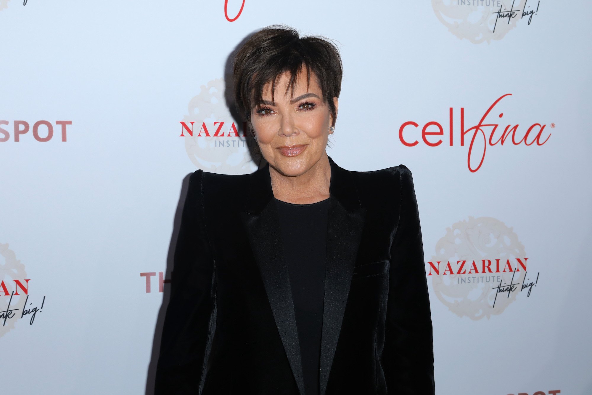 Kris Jenner smiles as she poses for cameras at the Nazarian Institute's ThinkBIG 2020 Conference