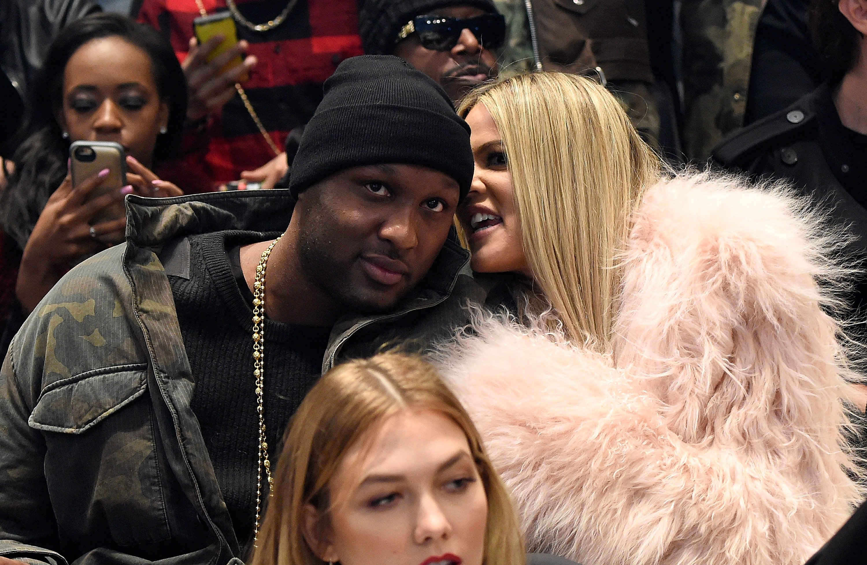 Lamar Odom and Khloe Kardashian at a Fashion Week show.
