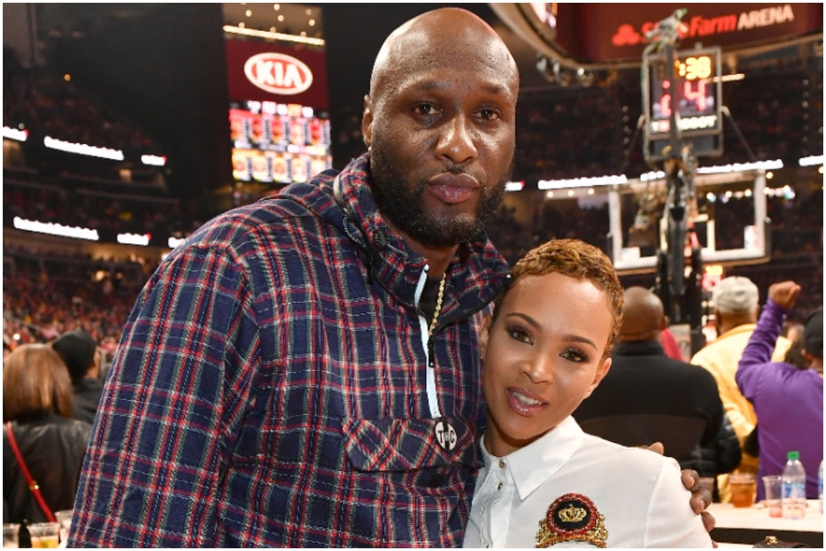 Lamar Odom and Sabrina Parr pose at the Los Angeles Lakers vs Atlanta Hawks at State Farm Arena