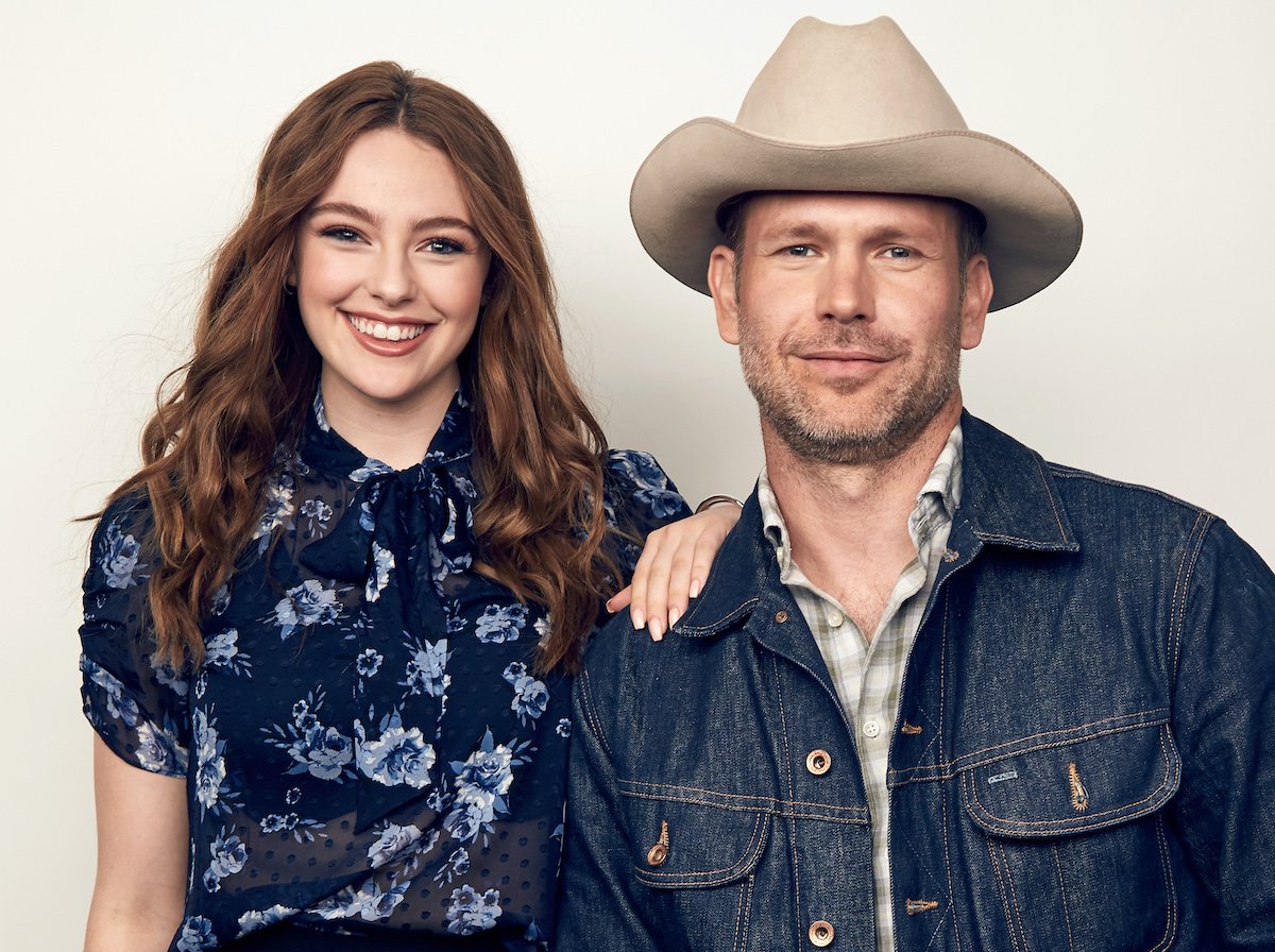'Legacies' stars Danielle Russell and Matthew Davis pose for a portrait in front of white background | Benjo Arwas/Getty Images