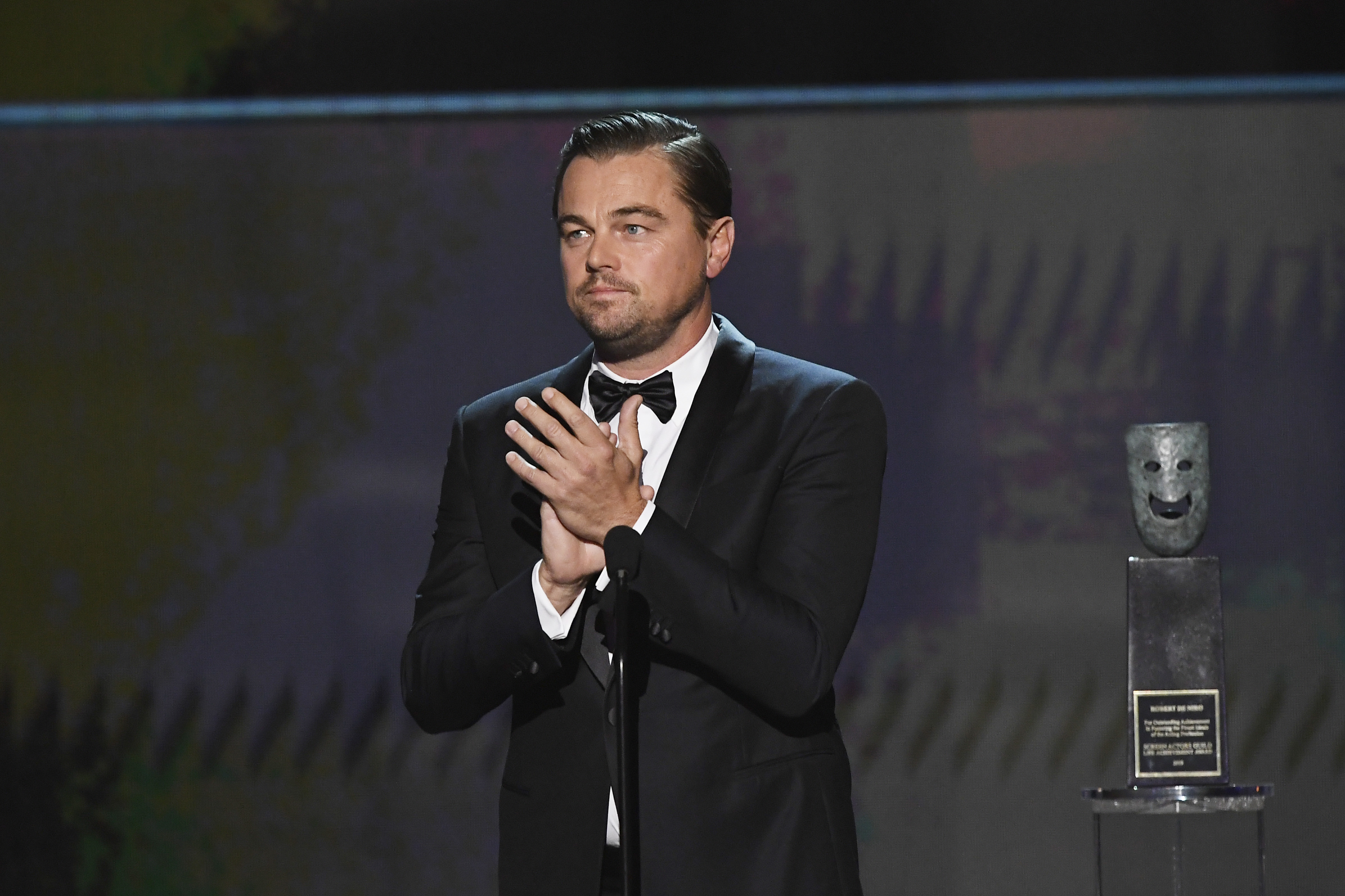Leonardo DiCaprio clapping