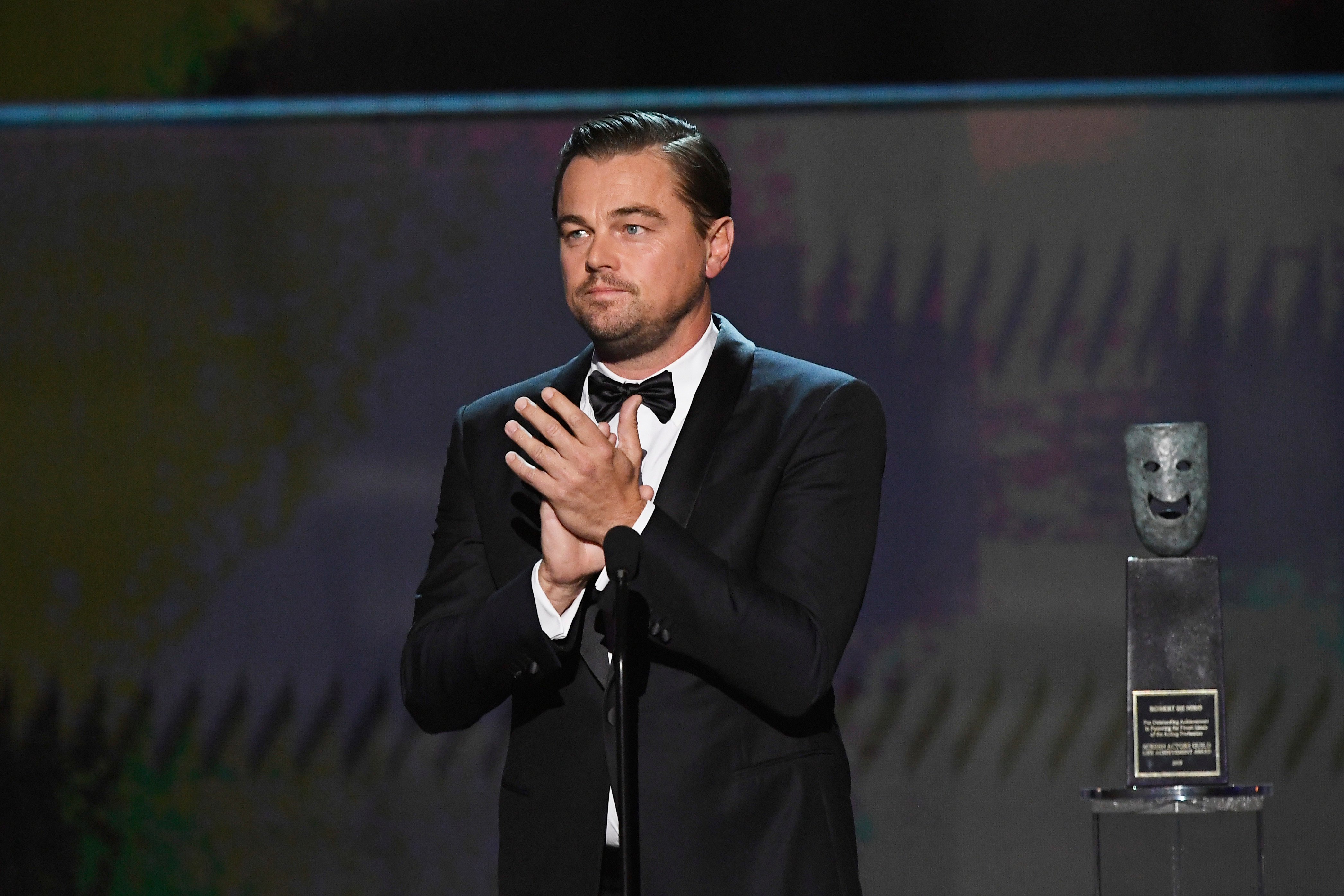 Leonardo DiCaprio clapping