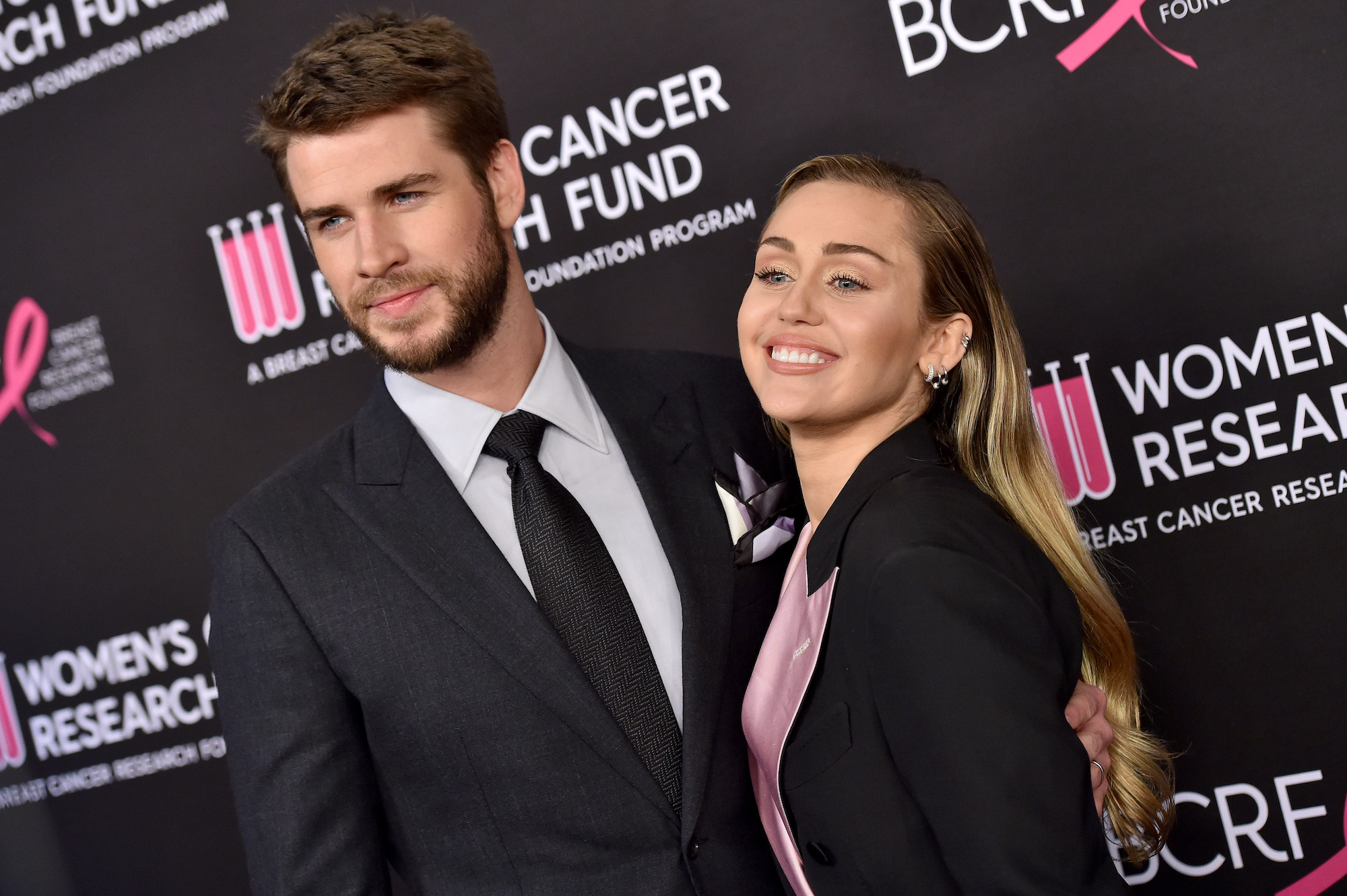 Liam Hemsworth and Miley Cyrus at the Women's Cancer Research Fund's An Unforgettable Evening Benefit Gala in 2019