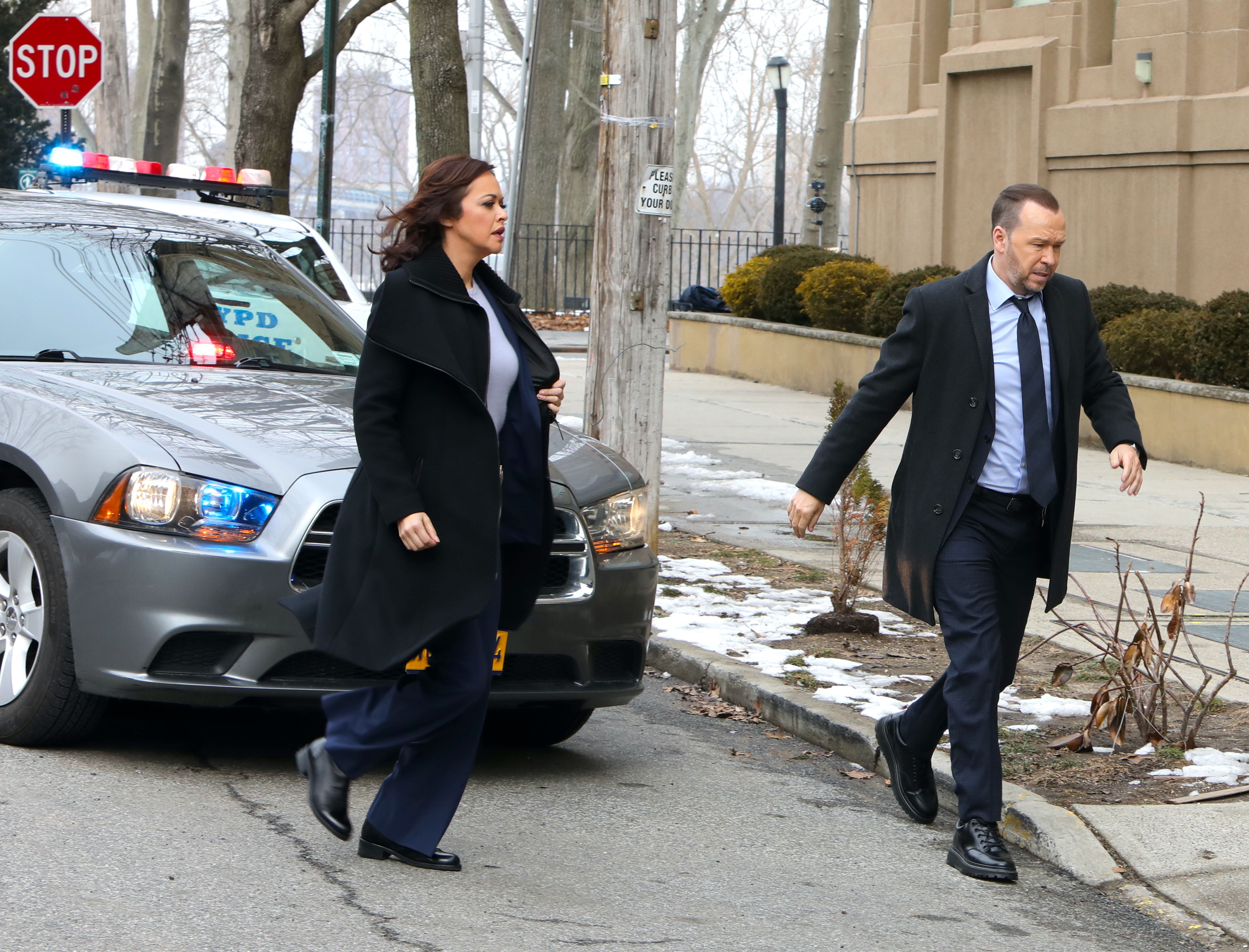 Marisa Ramirez and Donnie Wahlberg on the set of Blue Bloods | Jose Perez/Bauer-Griffin/GC Images