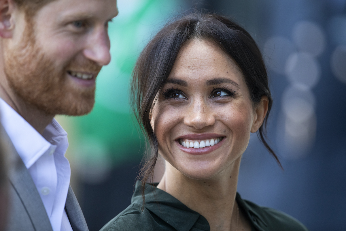 Meghan Markle stares adoringly at Prince Harry at an appearance in October 2018. 