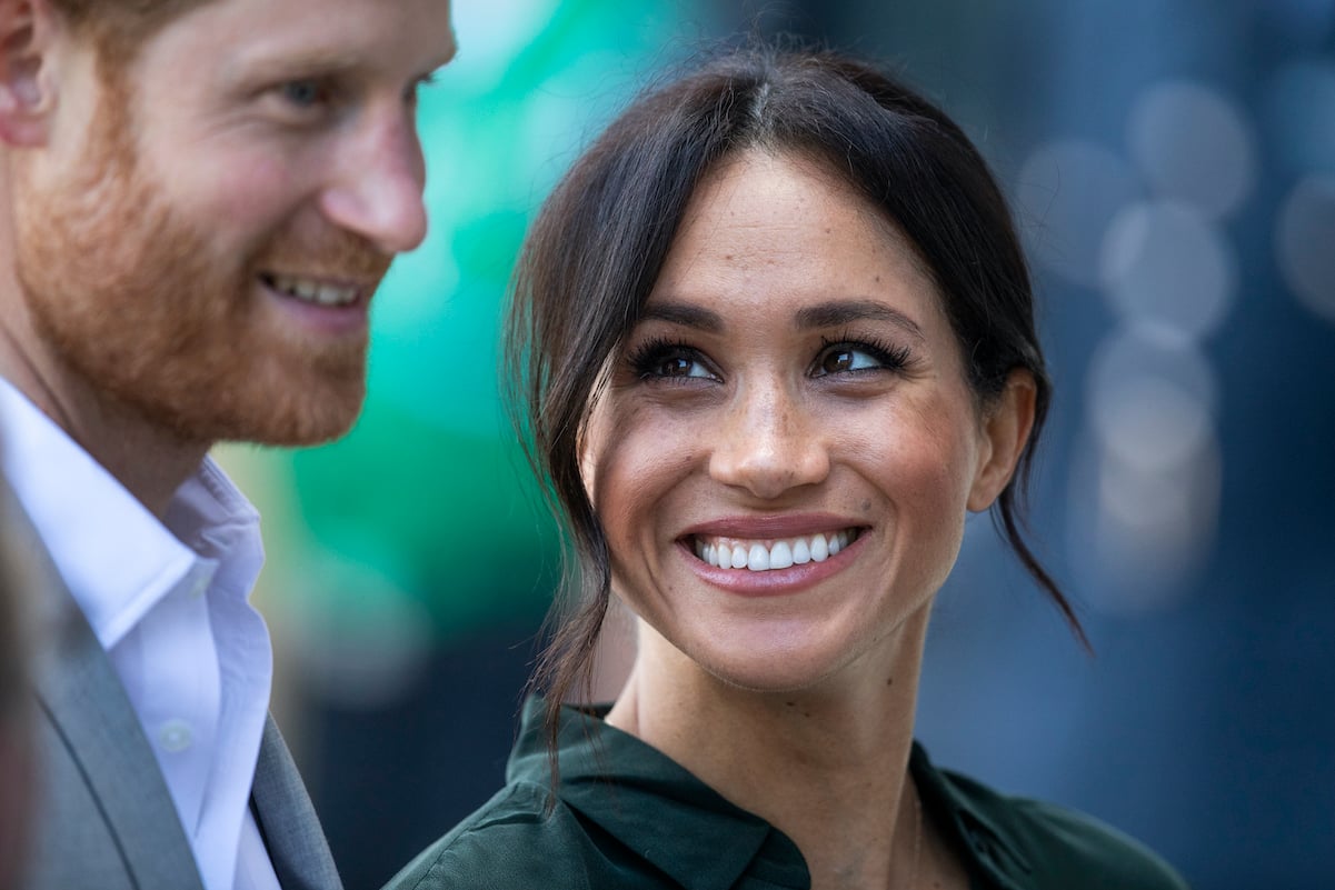 Meghan Markle stares adoringly at Prince Harry at an appearance in October 2018. 