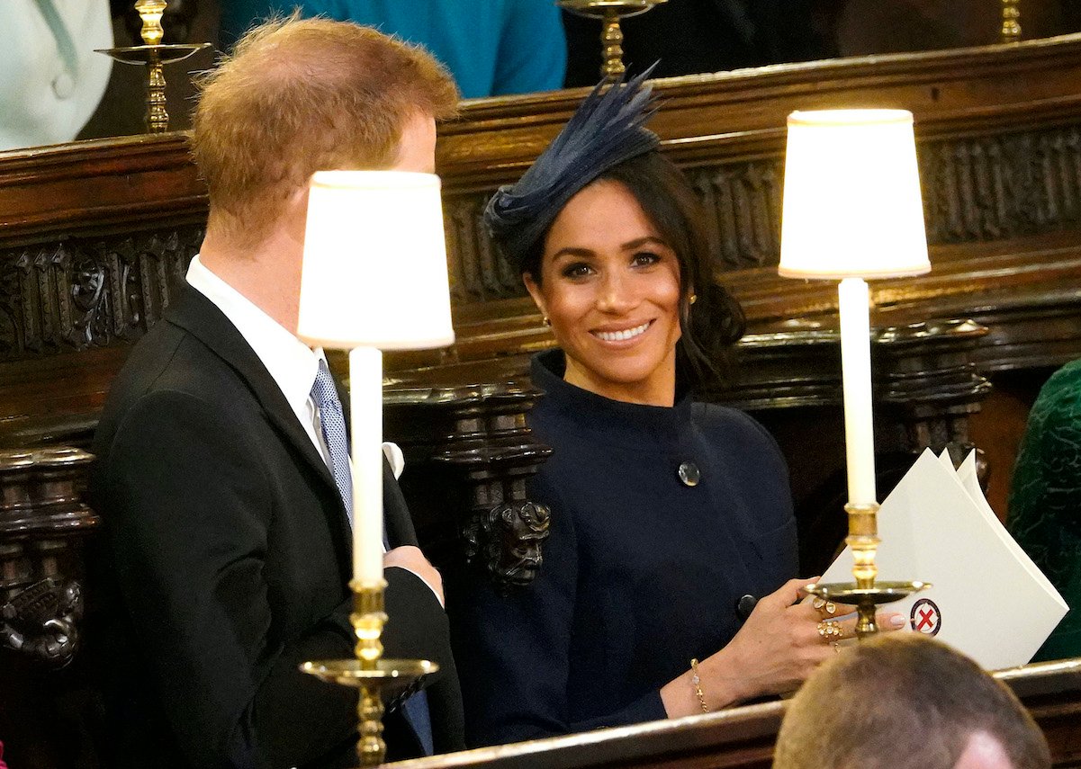 Meghan Markle is all smiles at Princess Eugenie's wedding to Jack Brooksbank in 2018