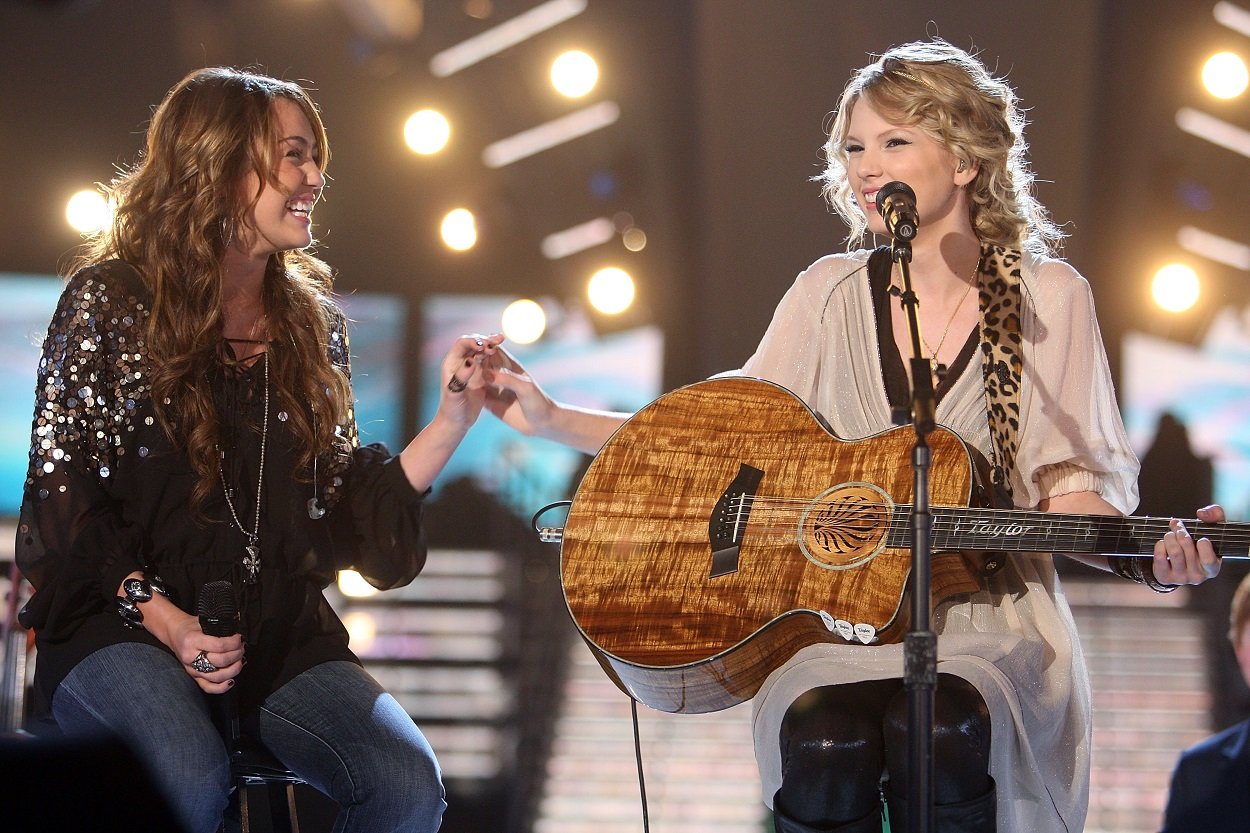 Miley Cyrus and Taylor Swift perform at the 51st annual Grammy Awards